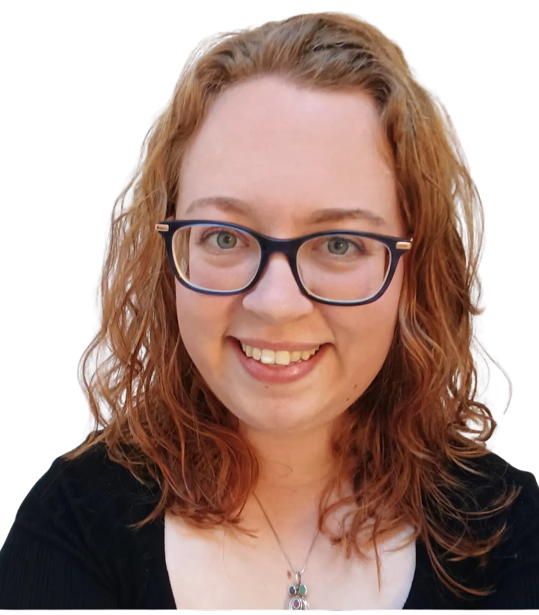 Close-up of a woman with curly blonde hair and glasses, smiling.