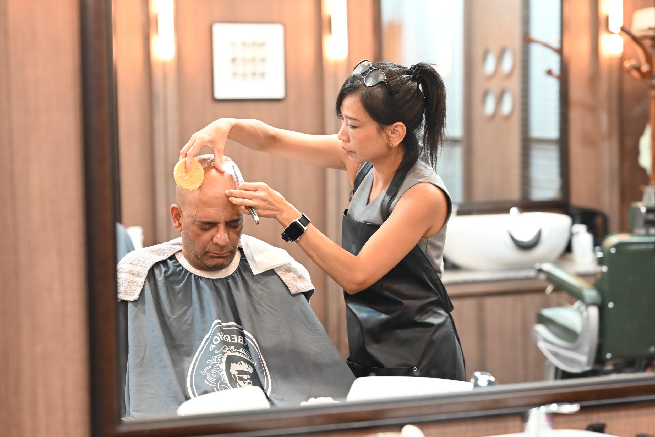A clean-shaven head isn’t just a style—it’s a statement. Niki’s expert razor work ensures a flawless, irritation-free finish that’s as smooth as it is confident. No patches, no rough spots—just pure, polished confidence.