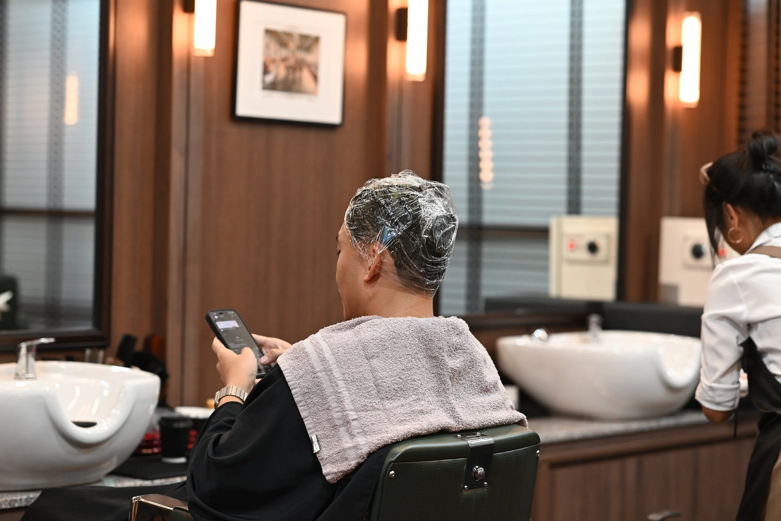 A little color, a big difference. Say goodbye to greys and hello to a refreshed, youthful look. While the black dye works its magic, there’s nothing left to do but sit back, relax, and maybe catch up on some texts. 😏 