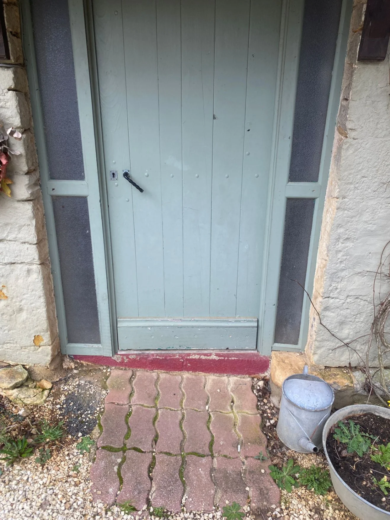 small step wonky into front door of gite
