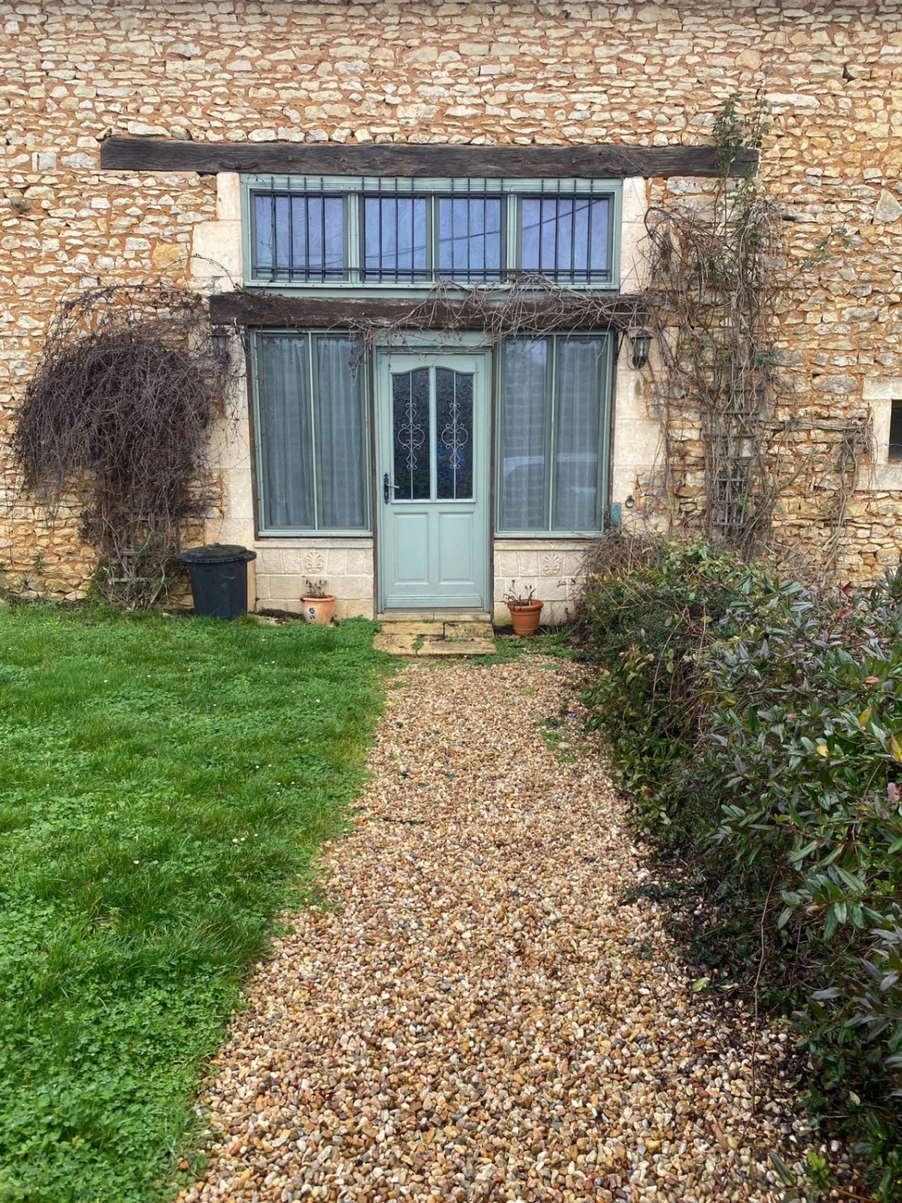 gravel pathway leading up to gite
