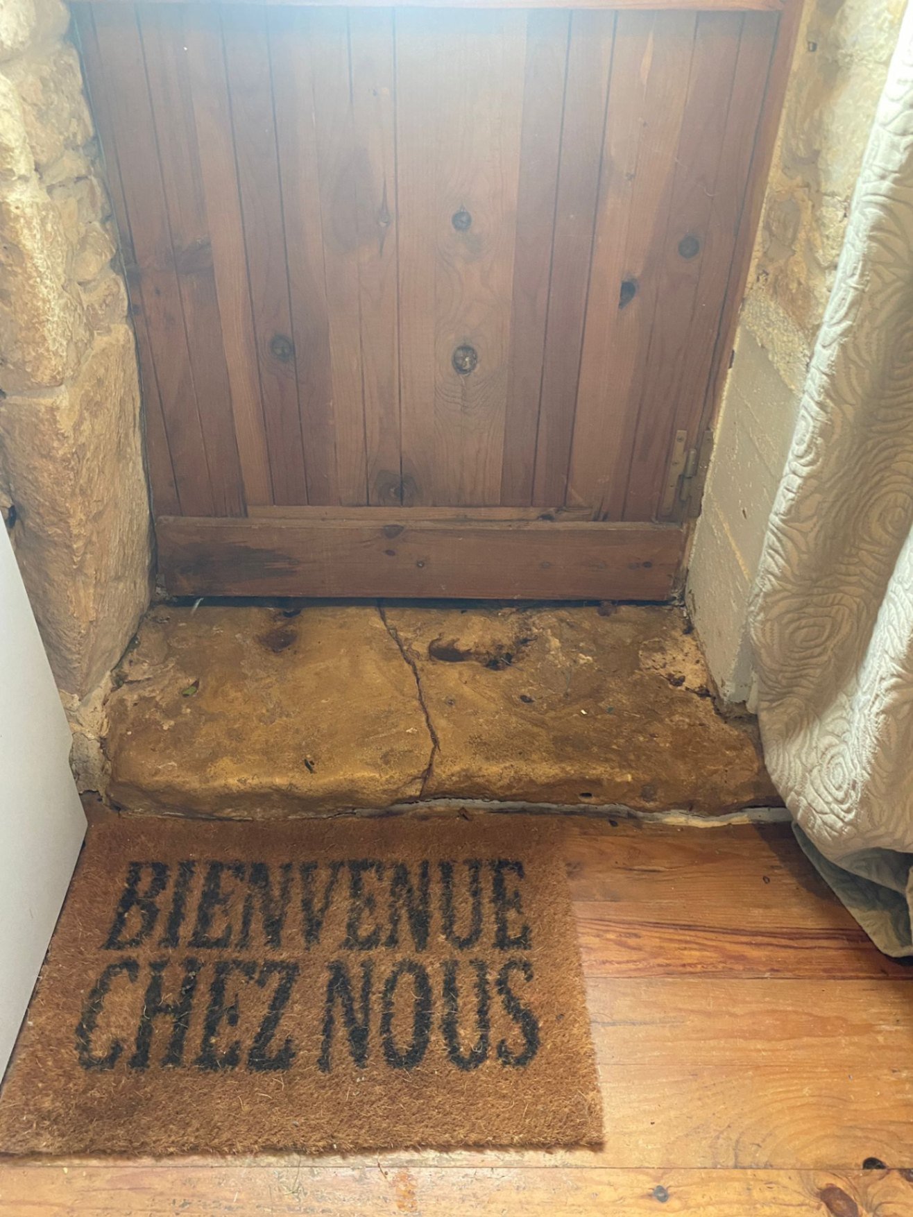 Internal low step inside front door, made of stone