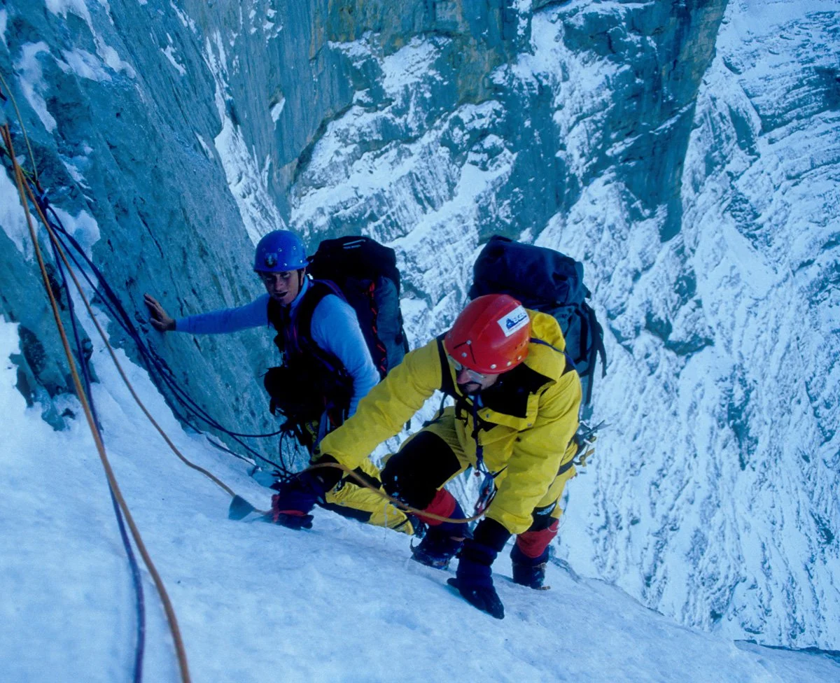 July 1985: Eric Perlman and Alan Bradley below the Ramp on the Eigerwand. We began climbing as a Spanish team was being rescued from high on the 1938 route, having been caught in a three-day storm that plastered the face with snow and ice. We wore cr