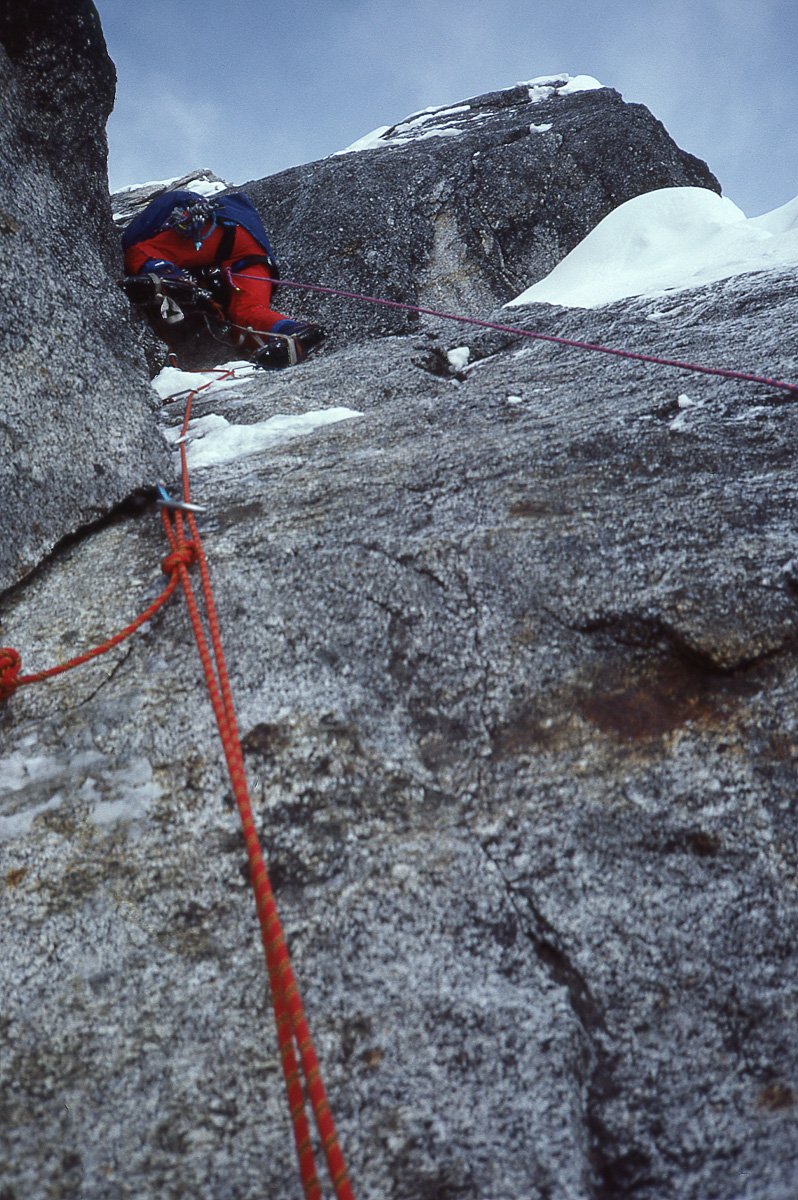 April 1985: John Stoddard leading the 17th pitch of the Colton-Leach route on the Rooster Comb, which was graded 5.9 A2 or thereabouts. A little higher than he is in the photo John was aiding off an RP nut and when it ripped he fell. It was only a sh