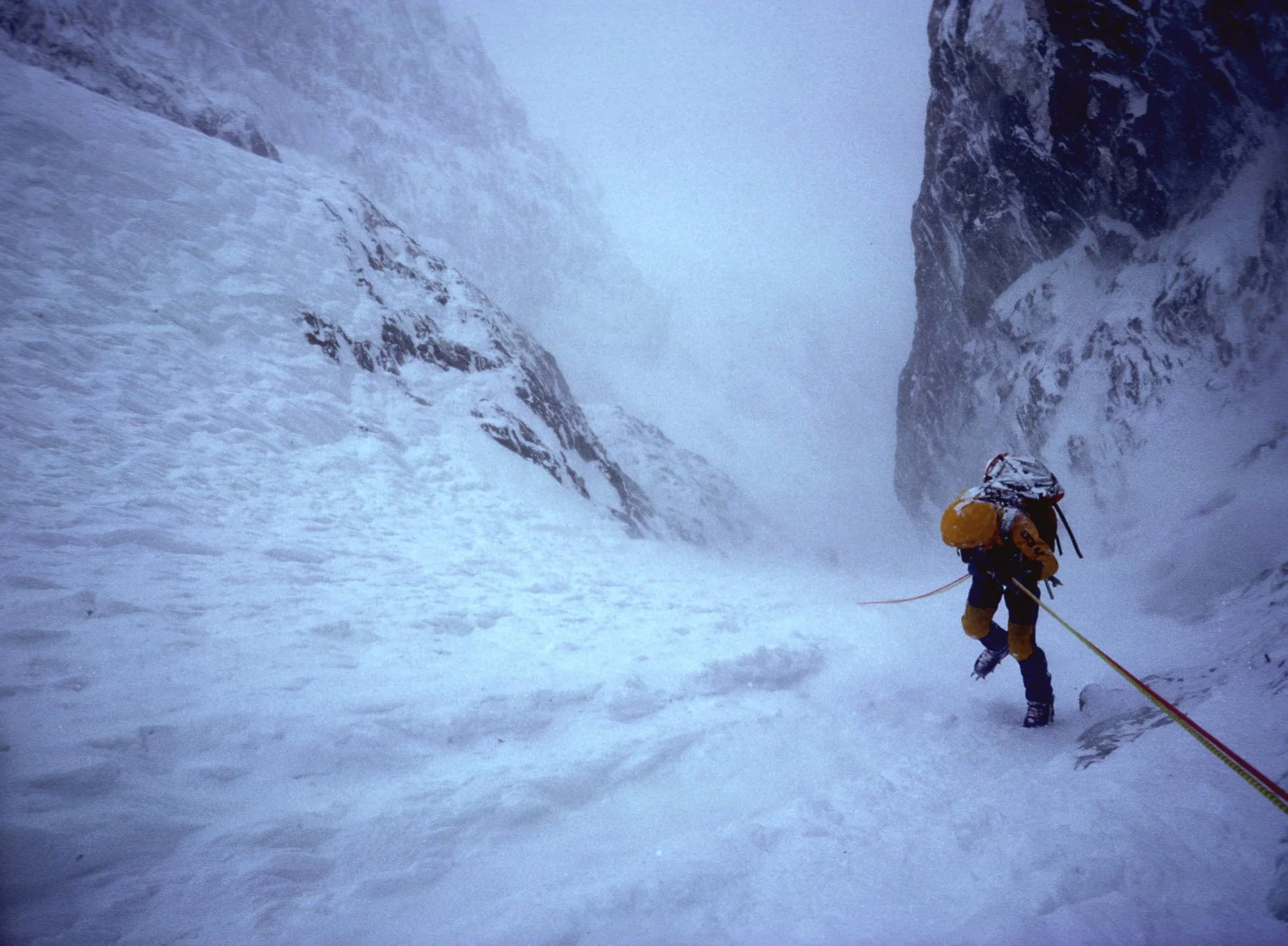 August 1988: Kevin Doyle descending into the avalanche scoured Merkl Gully at 25,100' on Nanga Parbat's Rupal Face, Pakistan.