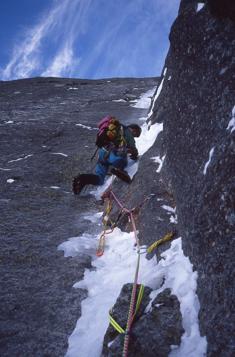 November 1989: Andy Parkin on the 5th pitch of what would later become a new route we named, “Beyond Good and Evil”, Aiguille des Pelerins, Chamonix, France. This was our first attempt, when we realized we weren’t going to run up it in a day, and tha