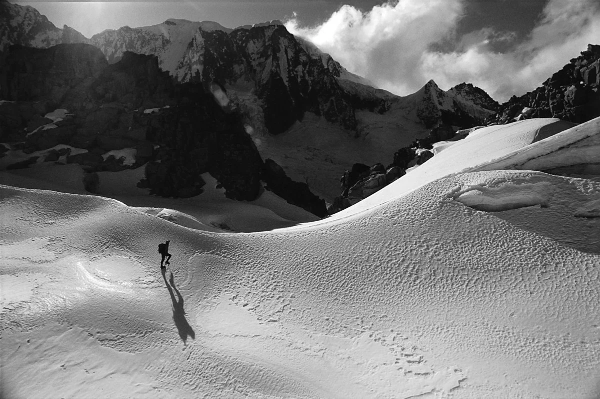 1996: Scott Backes on an acclimatization run in the Illampu massif. Pico del Norte, where we later climbed a new route we named, “Fuck ‘Em, They’re All Posers Anyway,” is in the background.