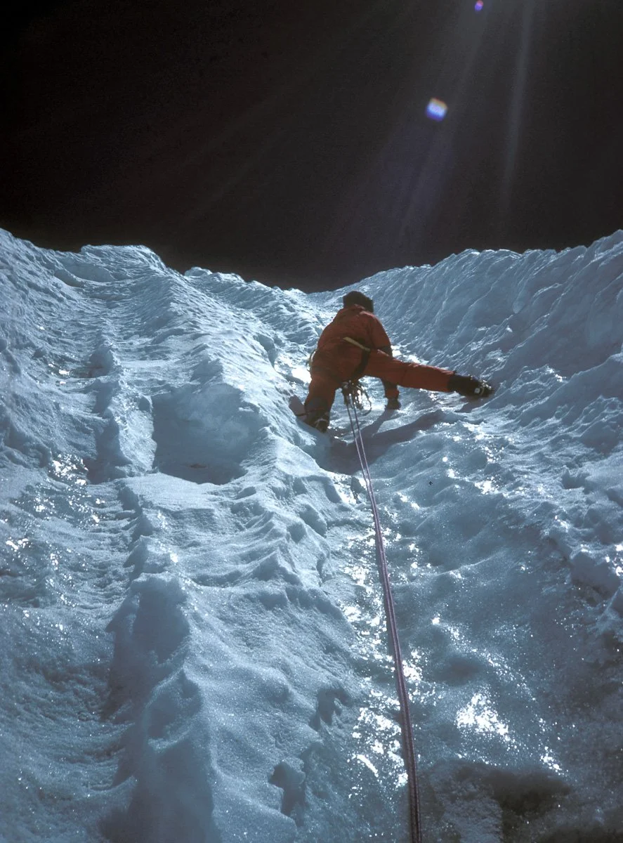 April 1986: MFT leading up the summit pyramid on Kangtega. Alison Hargreaves and I looked at it and figured it was four pitches so we took four ice screws and a single piton for the rock band we could see from below. The ice was bulletproof and the w