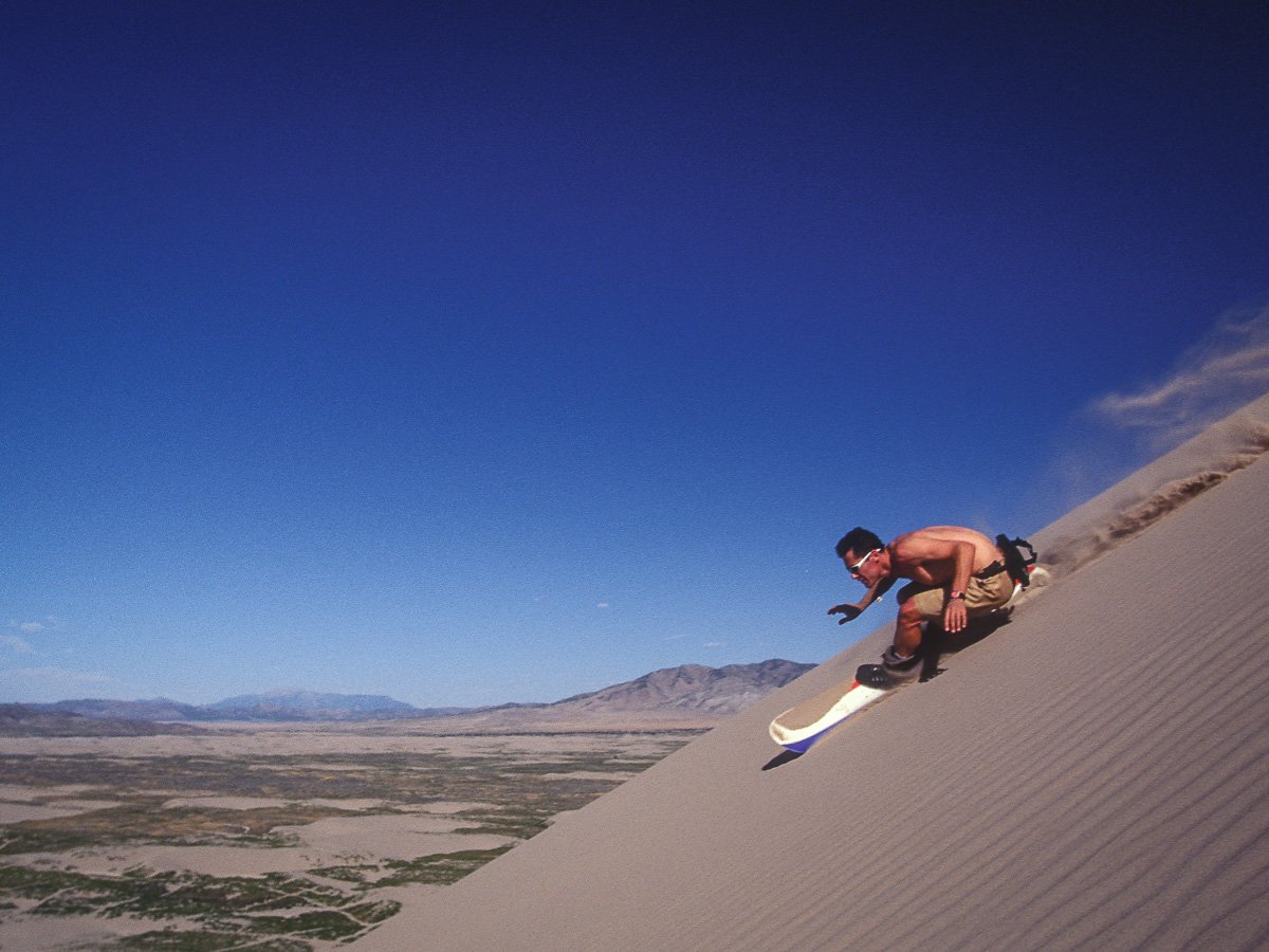 Late-90s: Andrew Bielecki introduced me to the idea of sandboarding. He’d done it on the giant dunes of the Great Sand Dune National Monument but we had better access and freedom in Little Sahara. With the right slope angle and fresh furniture polish