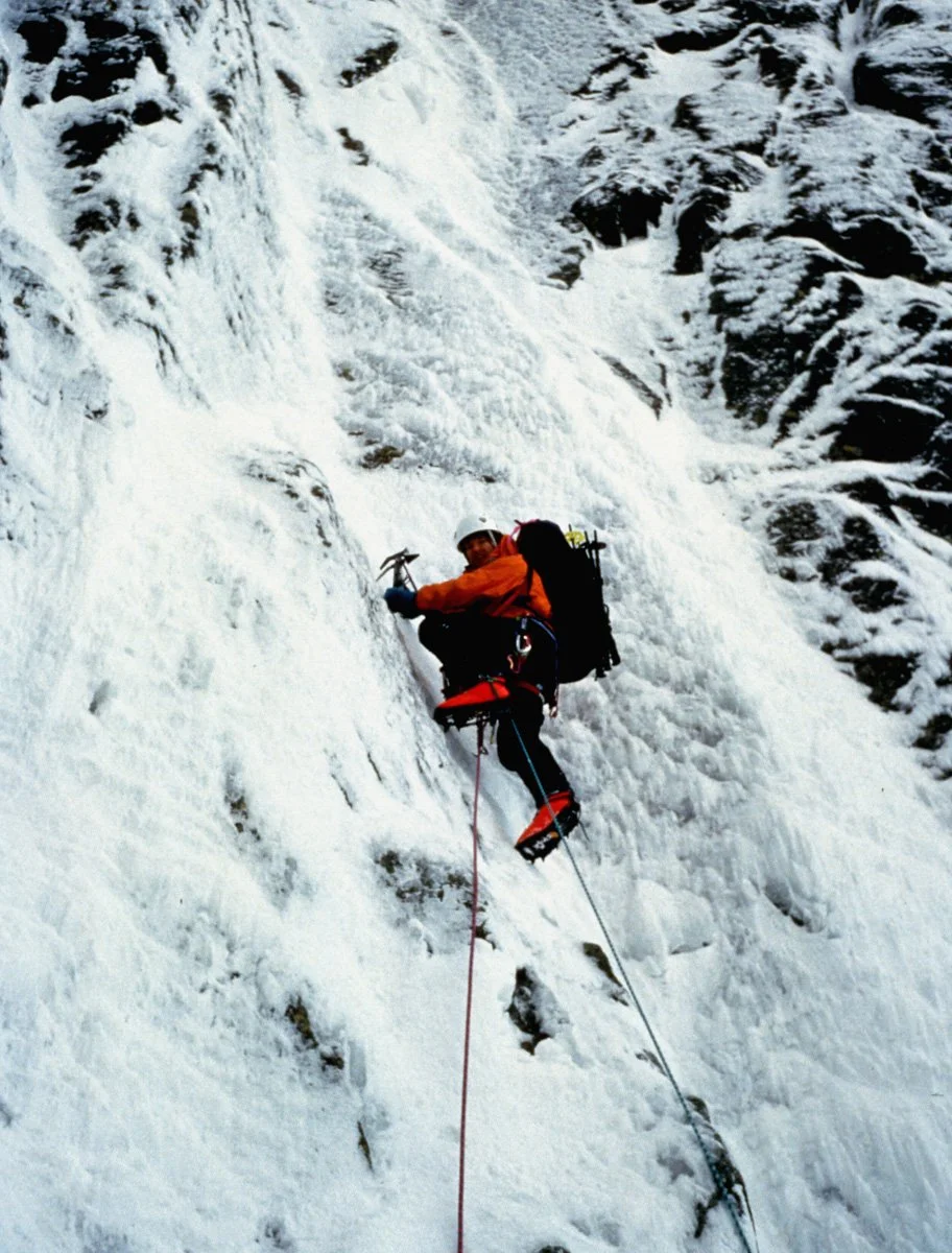October 1993: On the 2nd or 3rd pitch of Birthright. The ice was not really ice and quite thin but there was always just enough to coax us higher. The route offered some “memorable” climbing, specifically in the big corner where Scott could only plac