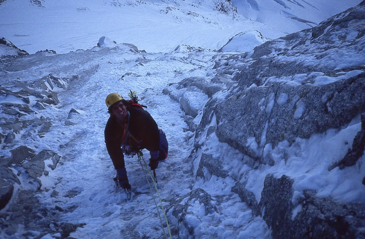 Autumn 1991: Barry Blanchard high on the northwest face of Les Droites during the first ascent of the “Richard Cranium Memorial” route. Within the space of fifteen feet he broke two ice tool picks, and in this picture I believe he is following with o