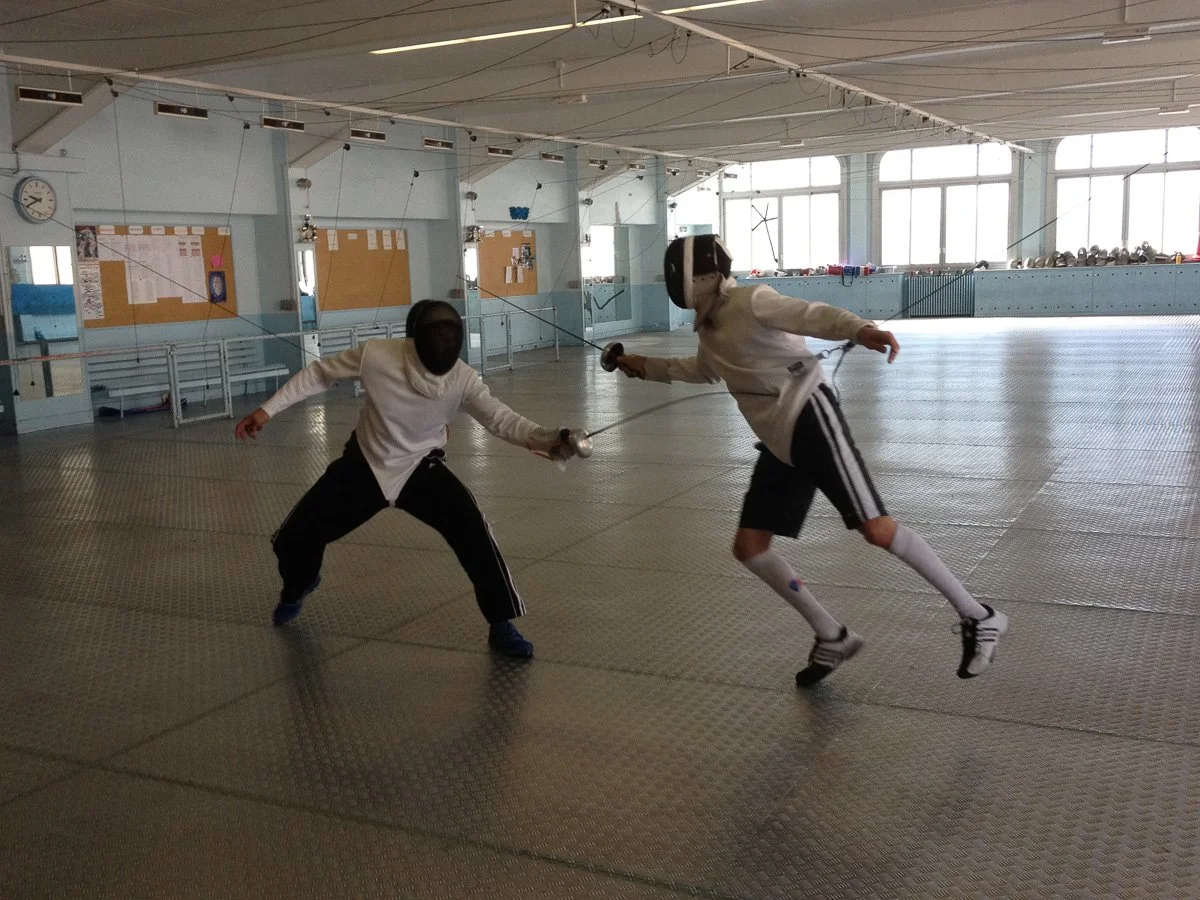 May 2012: Rich Cetrone at the Paris Racing Club. He had never done any fencing but a lot of boxing and martial arts so he had no trouble with the foot movement or hand speed. Over the weeks we used the space I got to watch him practice with current a