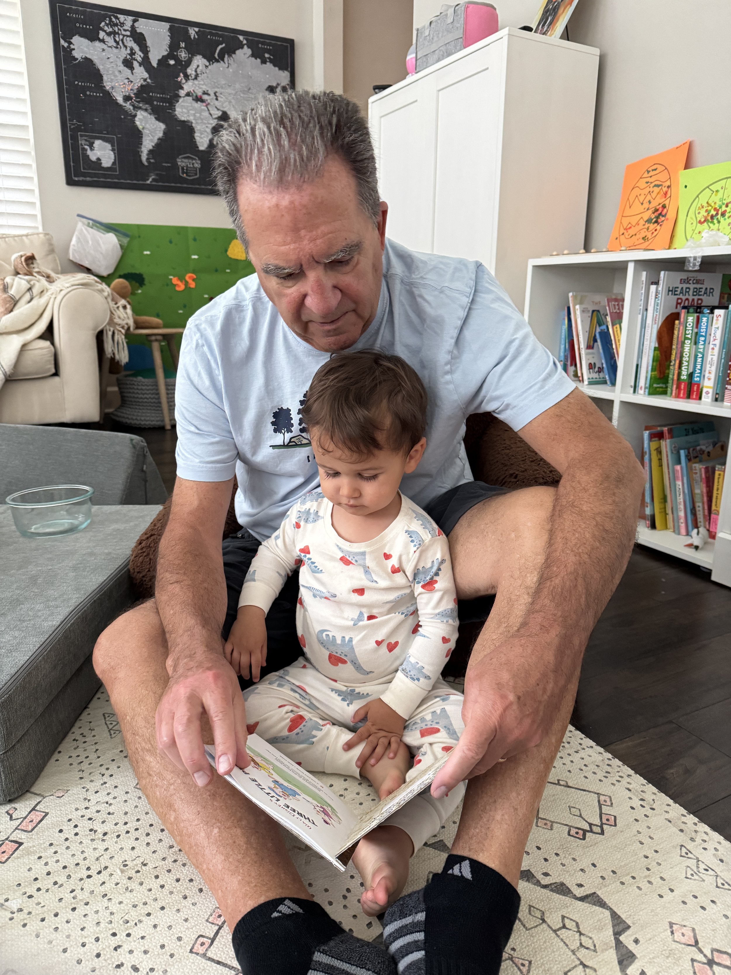 Pappy loves to read books with Cullen.