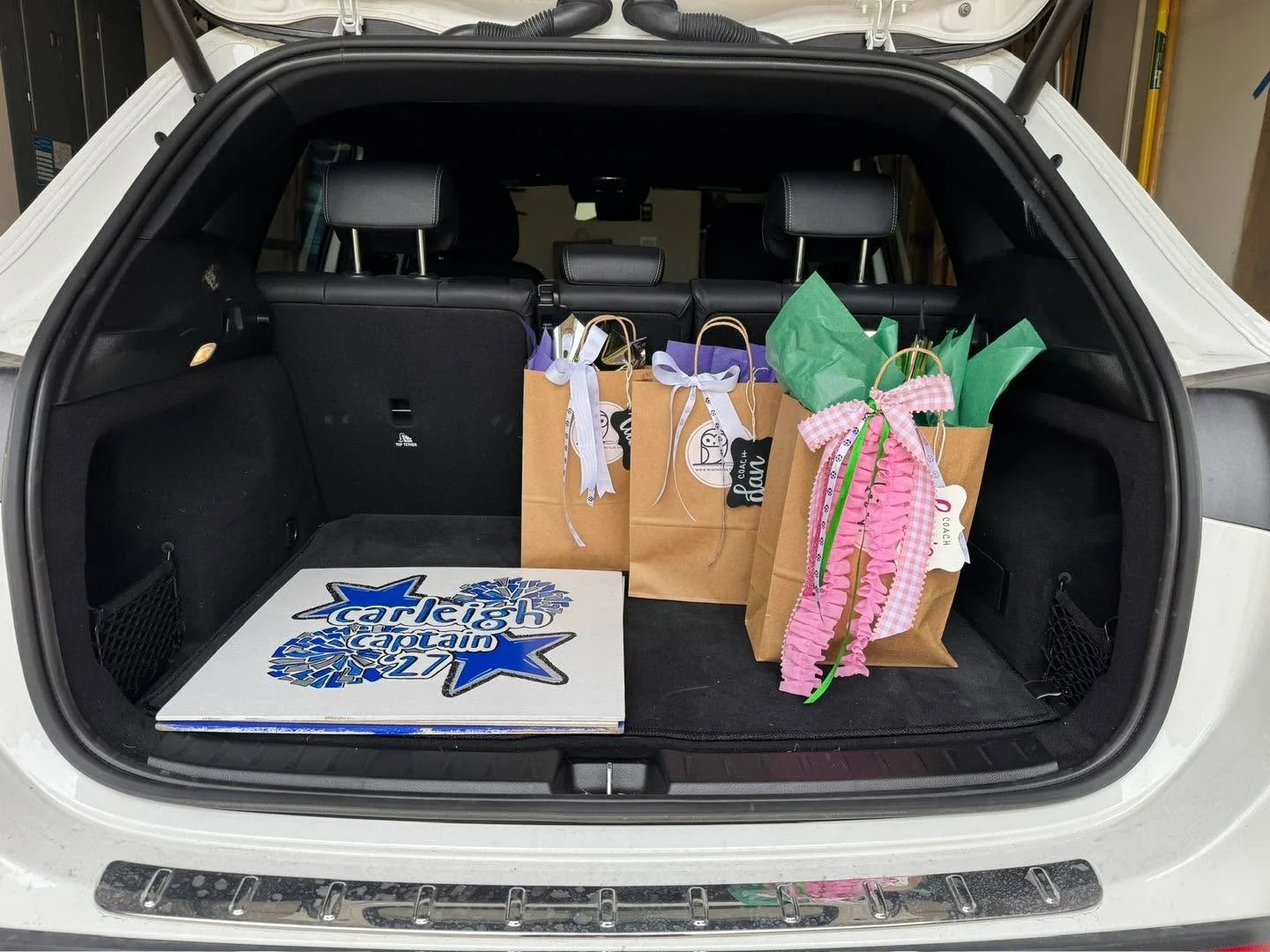 Yesterday was delivery day ✨

Three coach gifts headed out the door, including one that clearly understood the assignment and arrived fully committed to the extra-frilly pink ribbon life, plus custom cheer boards for a Byron Nelson senior celebrating