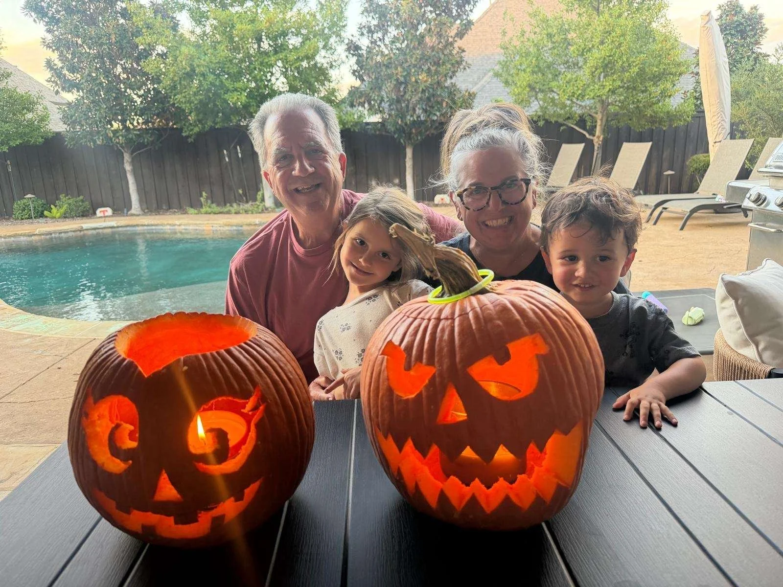 grandparents-grandchildren-halloween-pumpkins.jpg