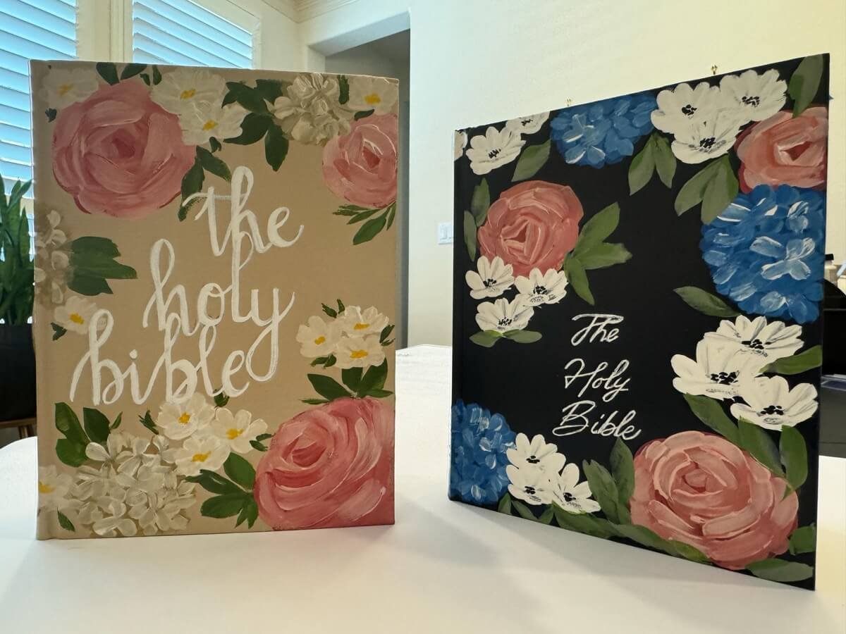 Personalized Bible featuring pastel florals and "The Holy Bible" text on the front.