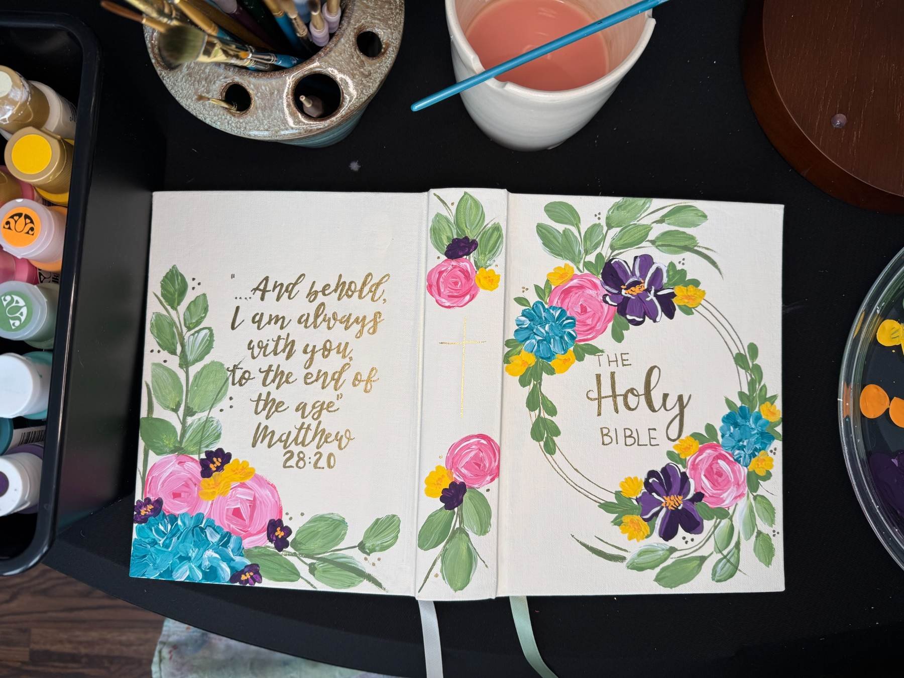 Custom hand-painted Bible featuring personalized artwork and faith-inspired details, created as a one-of-a-kind Christian keepsake.
