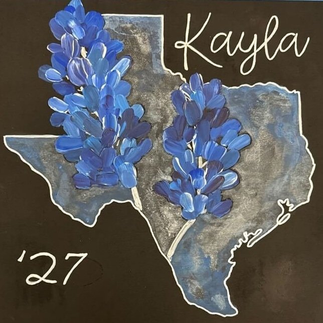 Custom cheer box featuring Texas state outline, blue flowers, and "Kayla '27".