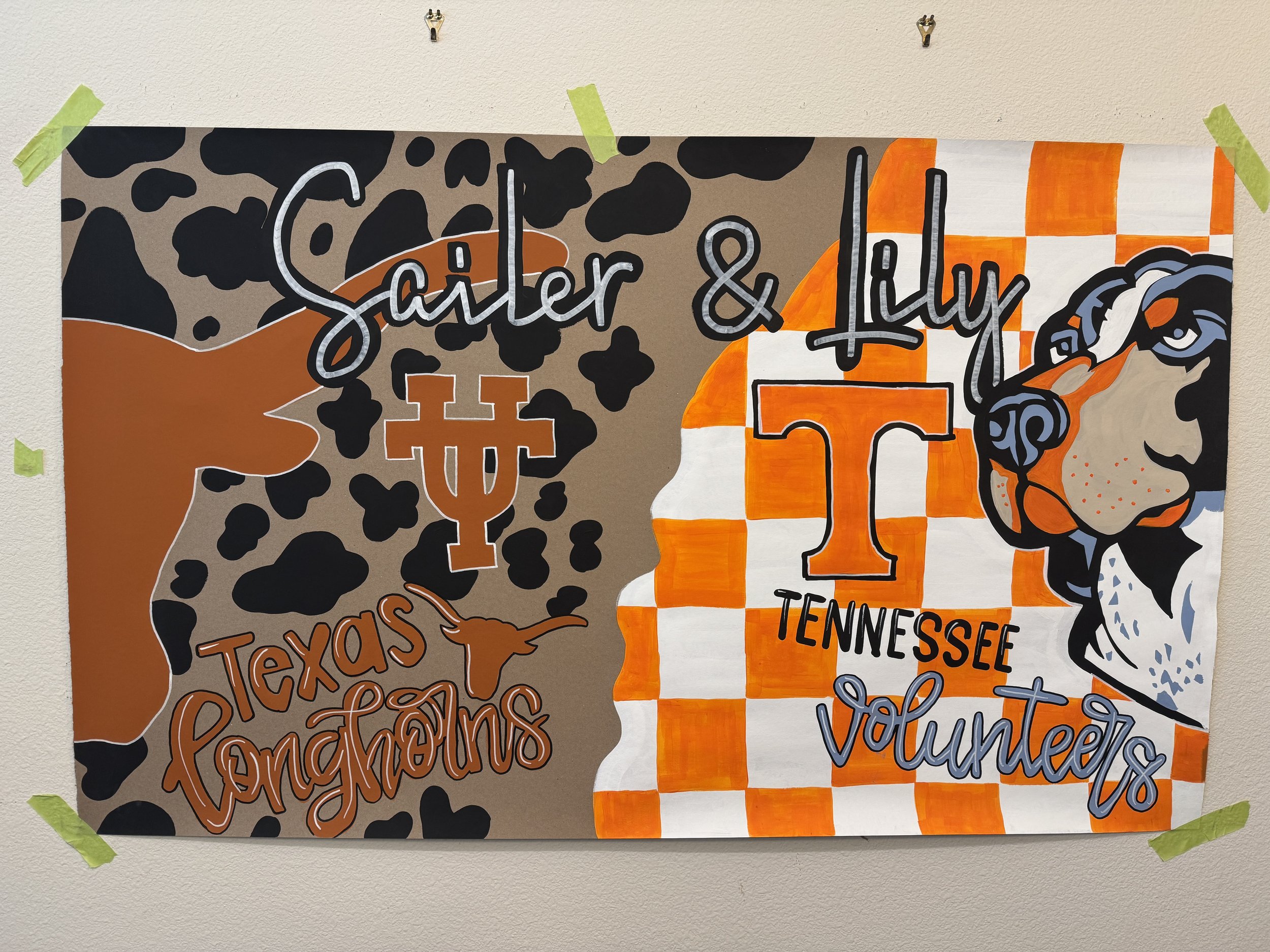 hand painted College graduation banner for two colleges university of texas longhorns and University of Tennessee Volunteers with mascots