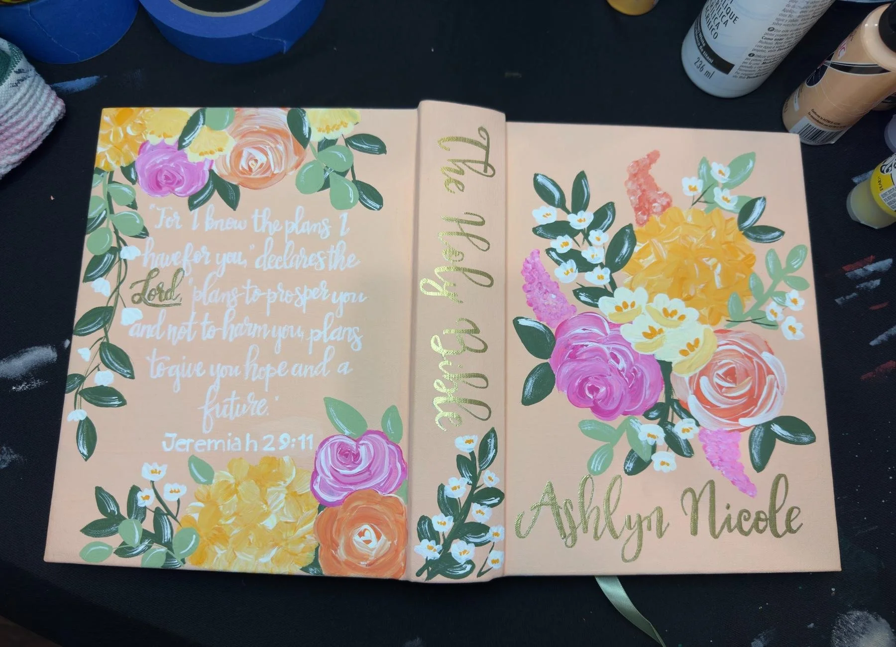 Personalized floral Bible for Ashlyn Nicole featuring colorful flowers and Jeremiah 29:11.
