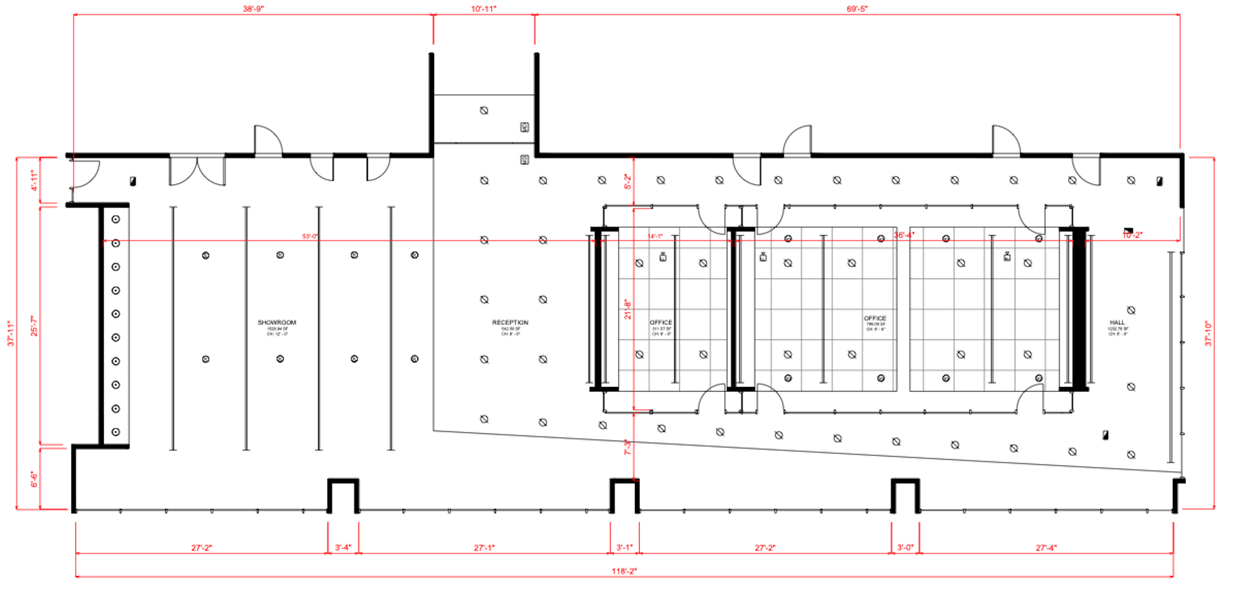 Architectural floor plan layout of a large building with marked measurements, including showrooms, reception, offices, and hall areas.