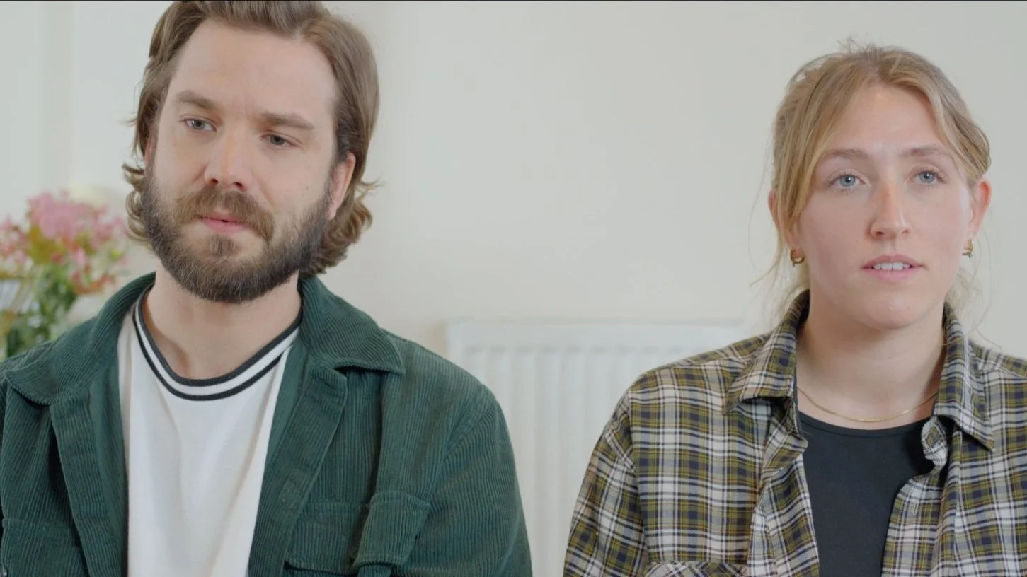 Two actors looking just past the camera with intensity during an acting for screen workshop