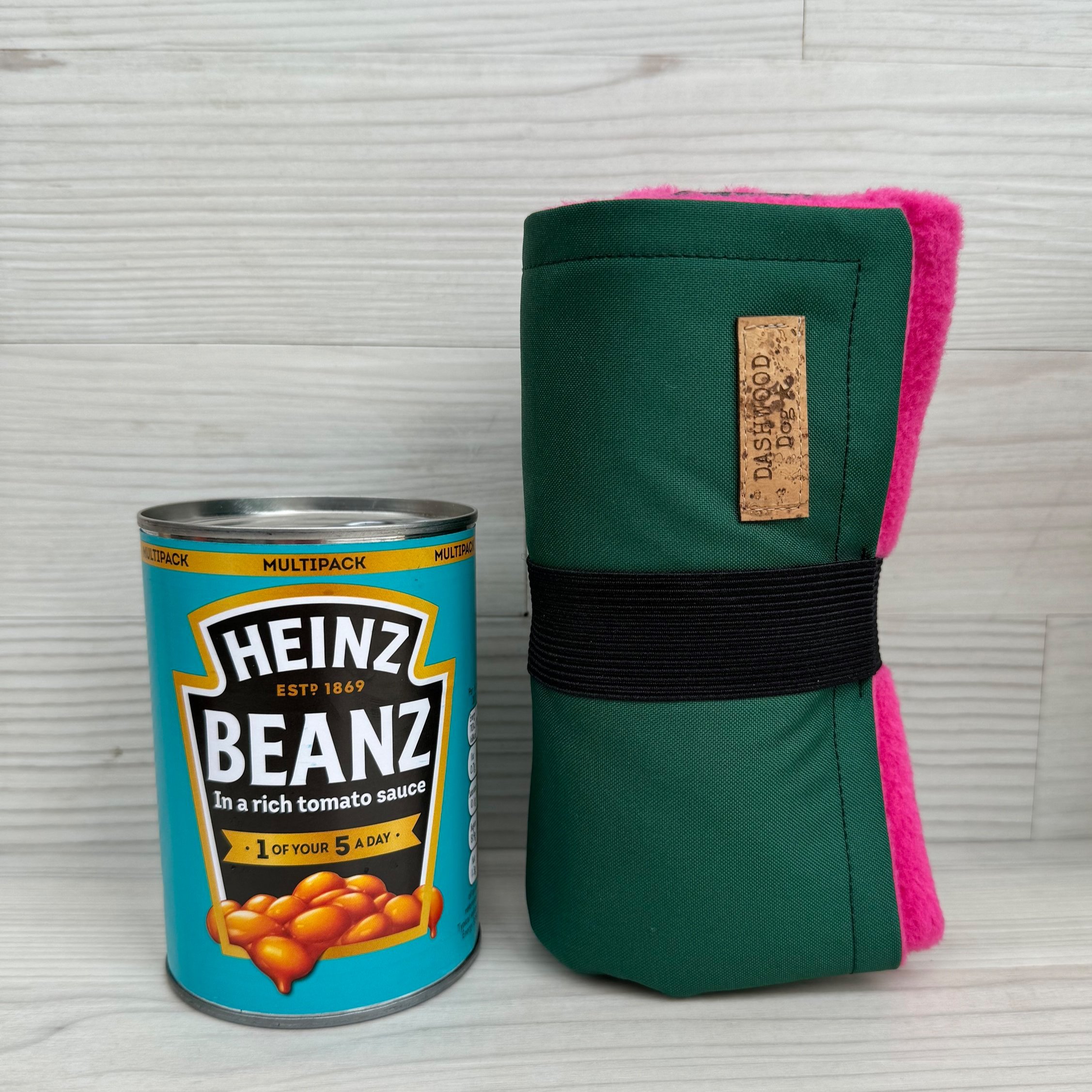 Dashwood Dog Compact waterproof fleece-lined settle mat next to a tin of Heinz Baked Beans