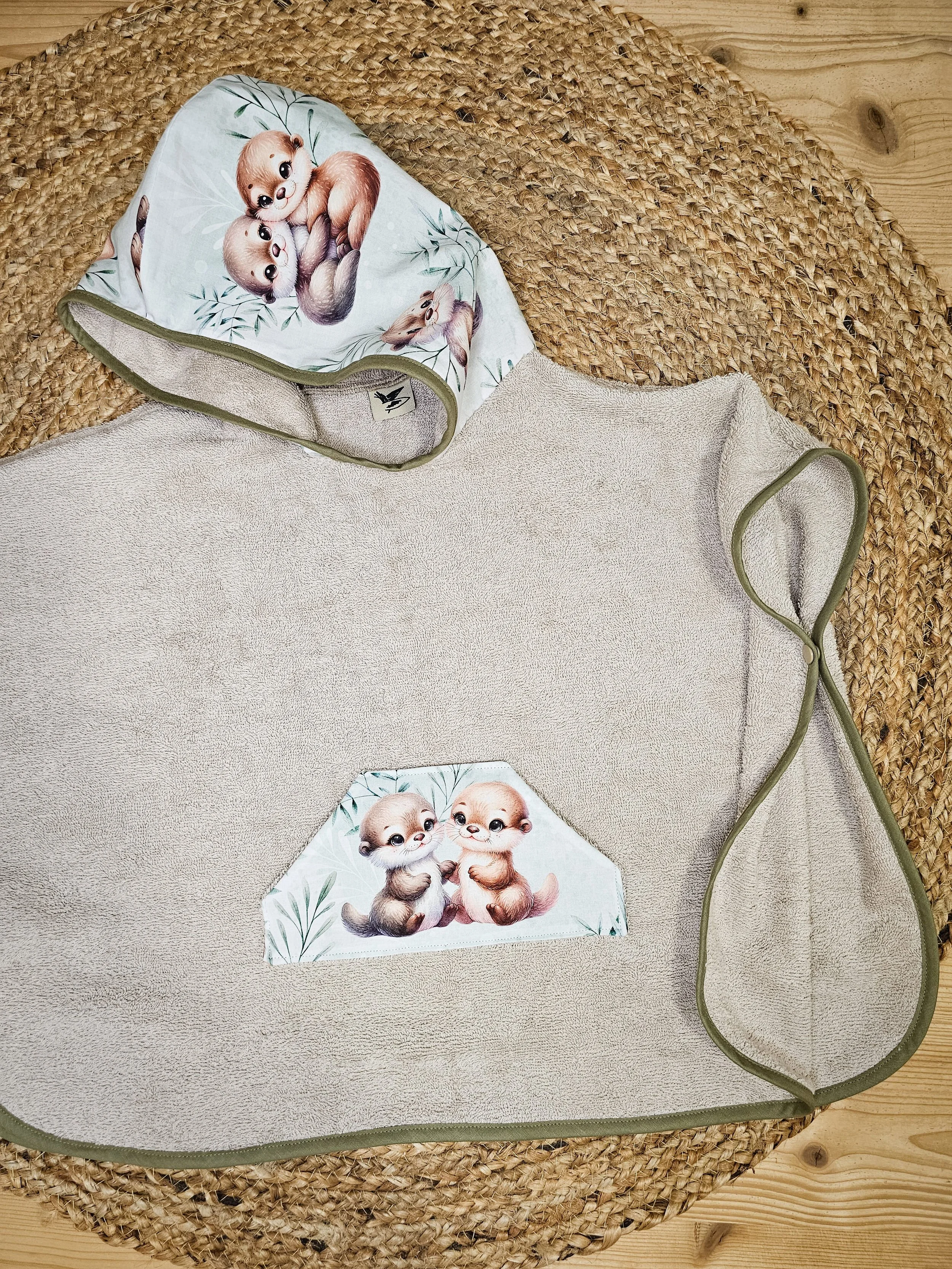 PONCHO BEBE LOUTRES (2).jpg