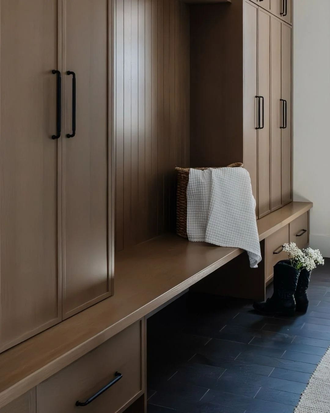 Often overlooked, but one of the hardest-working spaces in the home.

The mudroom is the transition between outside and in, where shoes get kicked off, bags get dropped, and the day begins to slow down. A space designed to catch the chaos while still