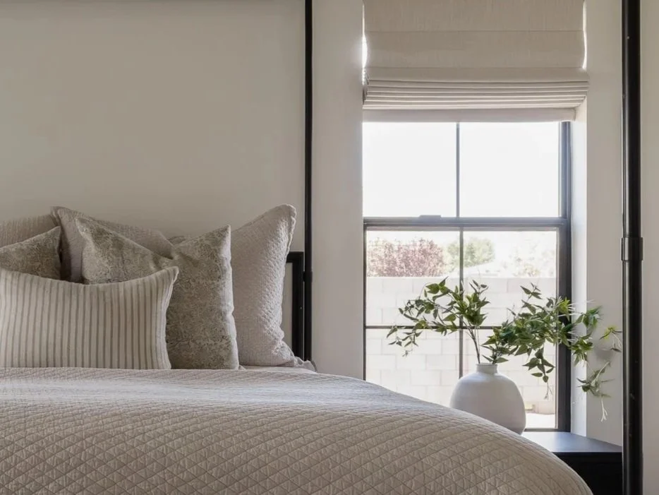 Primary bedroom interior in a Queen Creek custom home showcasing luxury organic modern interior design by Wren House Design.