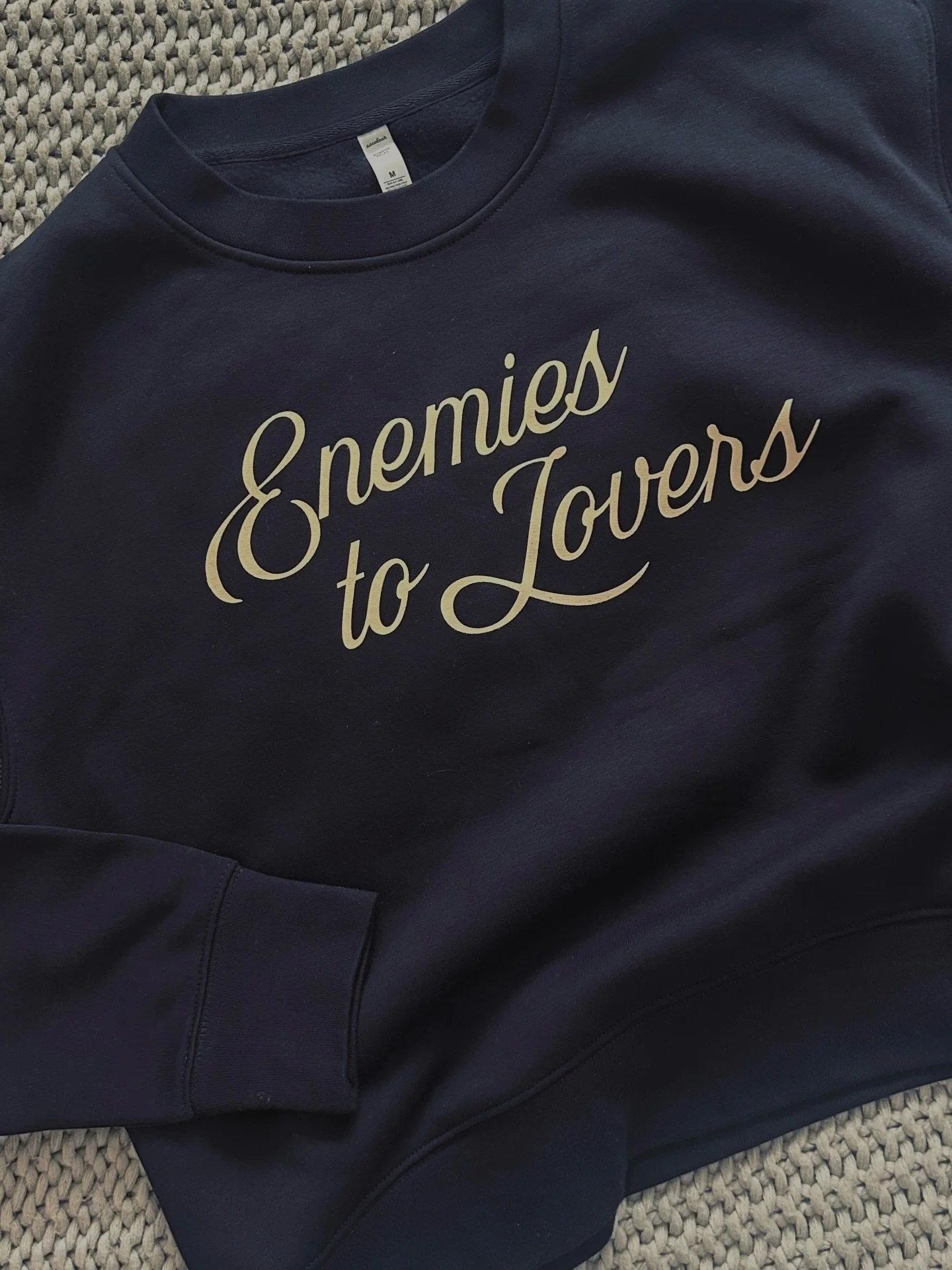 Keep your friends close and your enemies closer 😉 ink blue with cream font, these cropped sweatshirts are soooo comfy and cute. You probably need one.