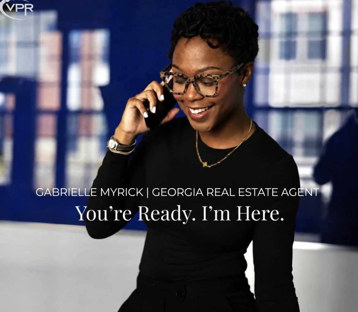 Georgia real estate agent Gabrielle Myrick answering a client call, representing responsive and available service.
