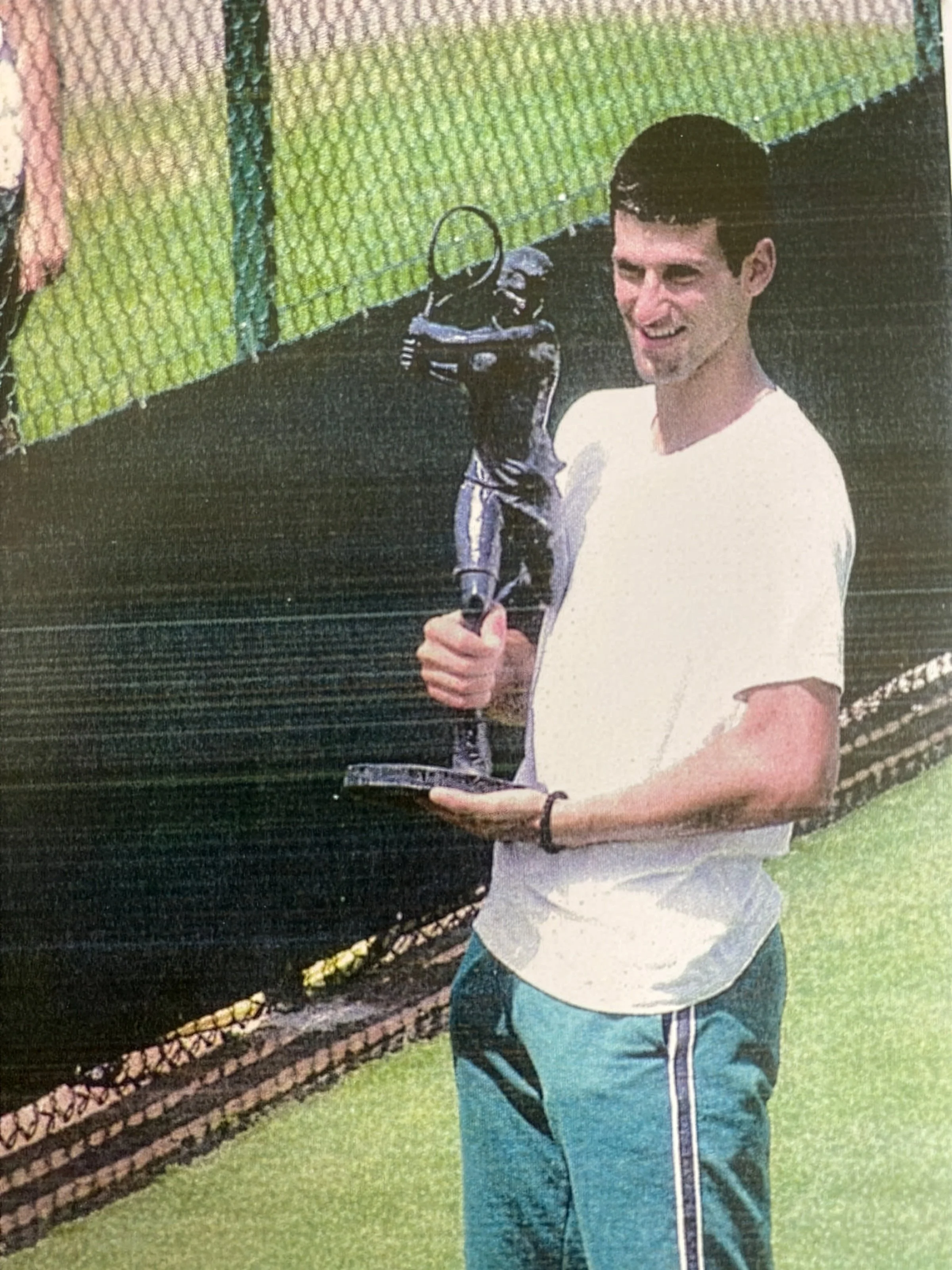 Djokovic with sculpture.jpg