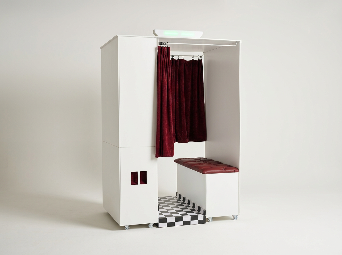 Vintage-inspired enclosed photo booth setup for a wedding reception in Calgary