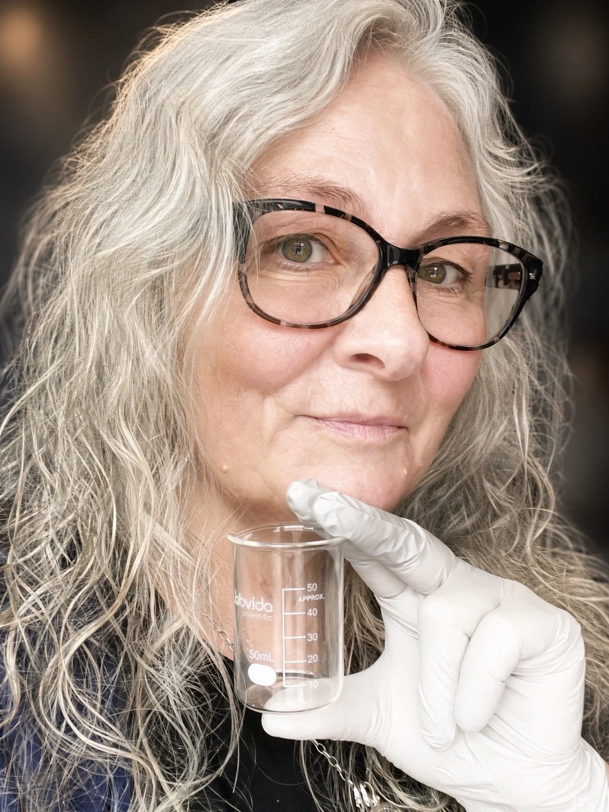 Carol McEwin, founder and formulator of LS.Topaz, in her lab