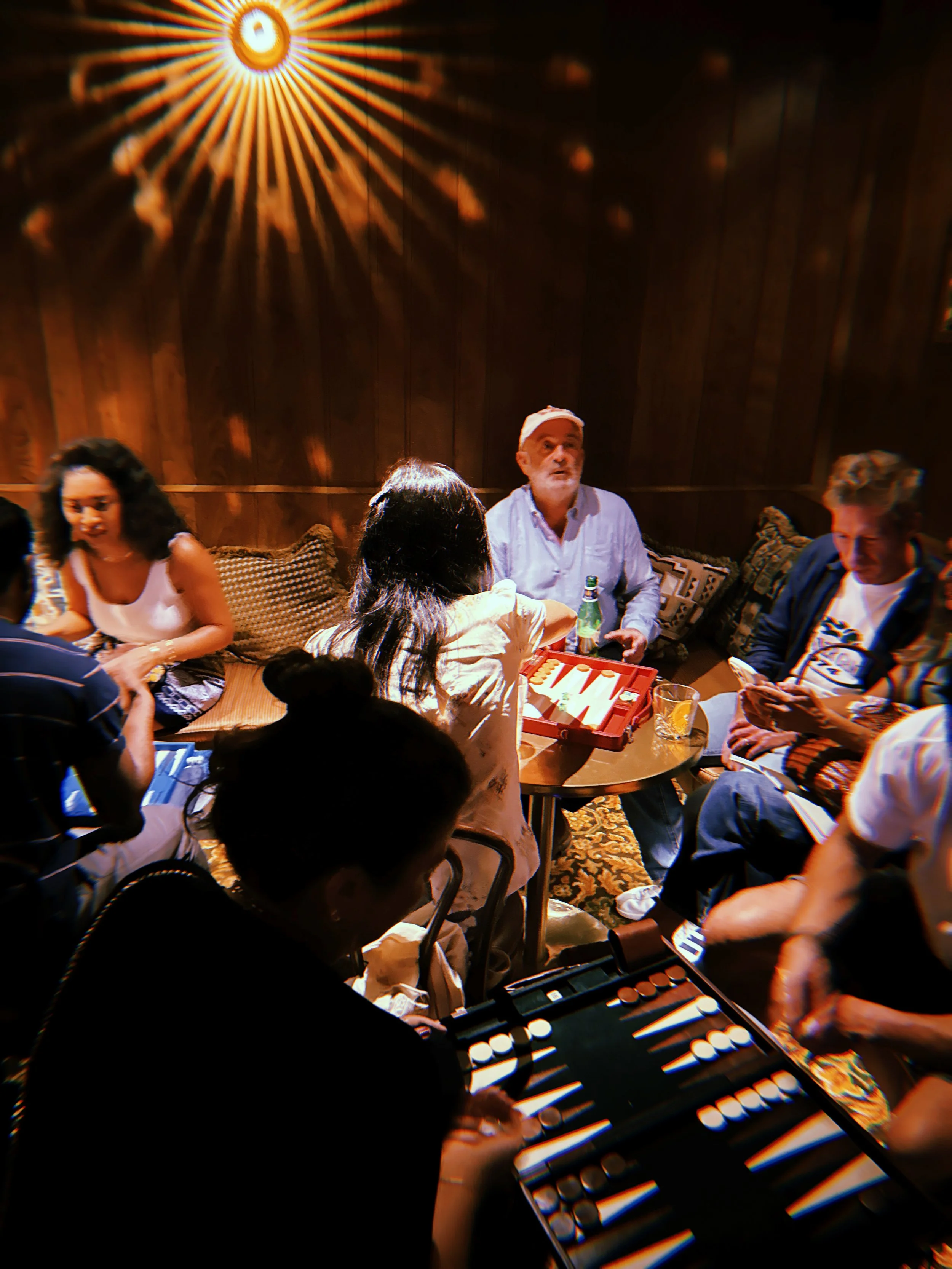Guests gather for backgammon and conversation at the Academy NYC Player Party.