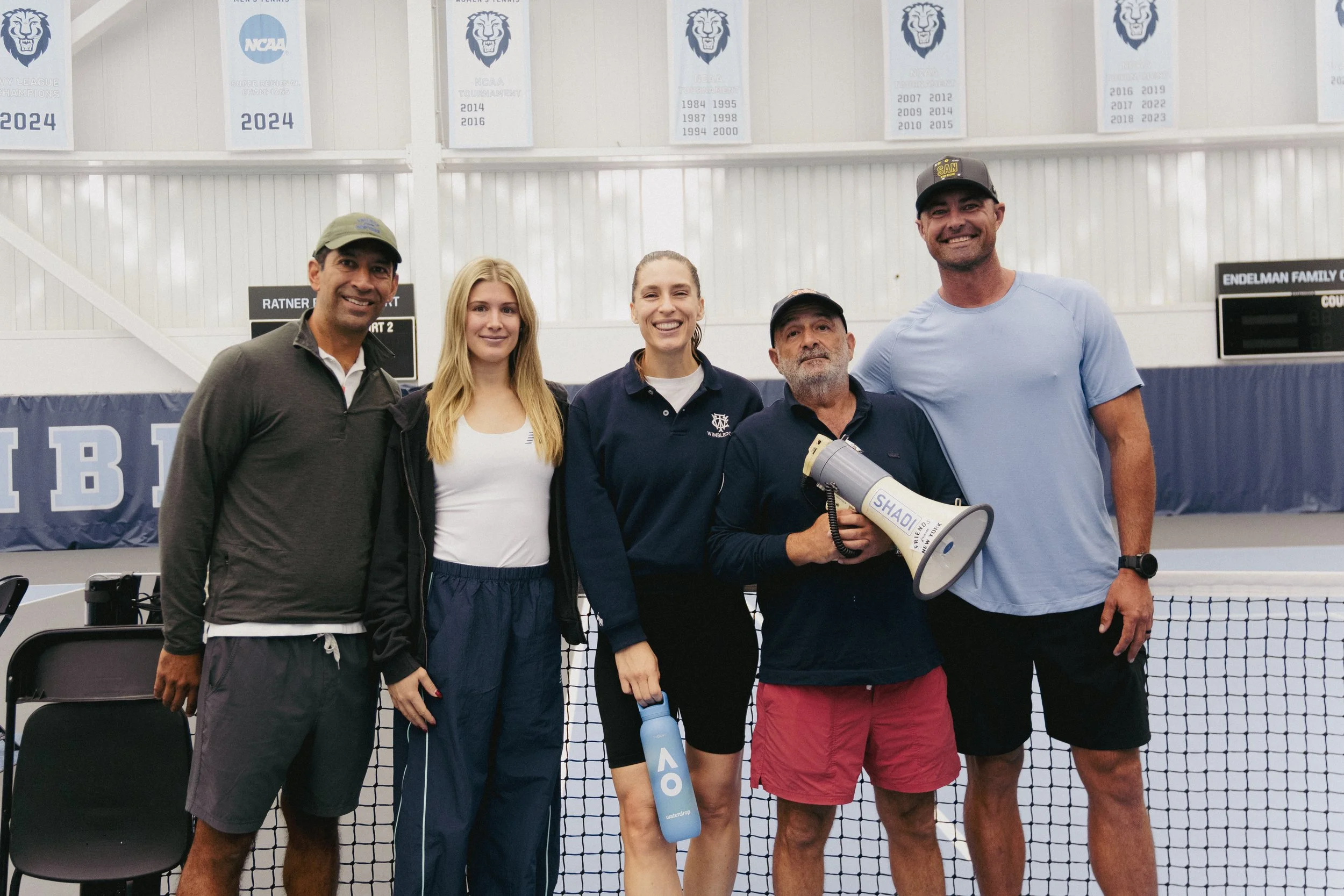 Academy Day NYC guests and players together on court at Columbia University.