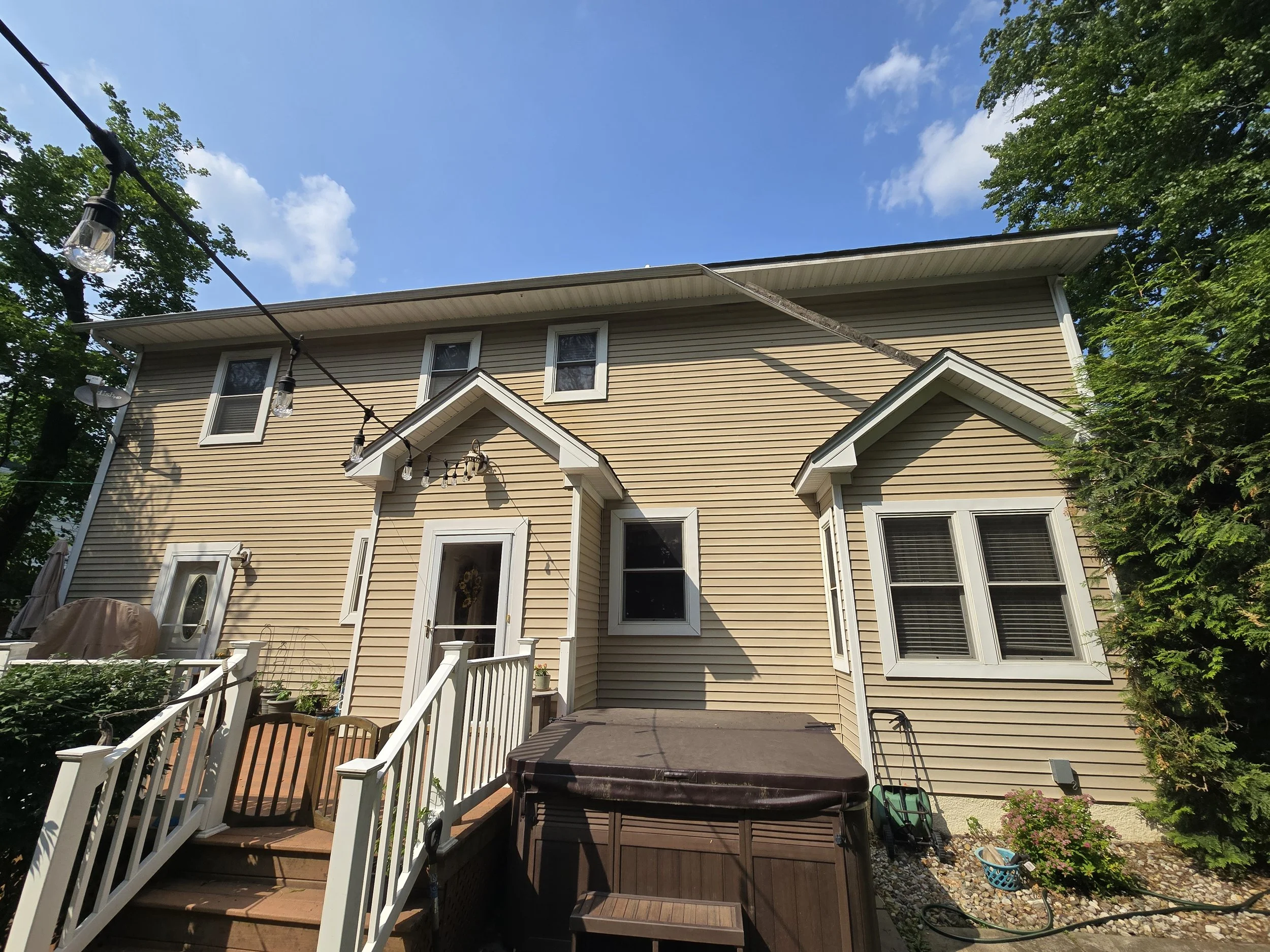 Failing gutter pulling away from fascia in Roseland, NJ before full gutter replacement and new gutter guards.
