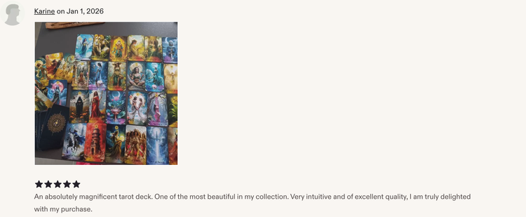 Etsy review screenshot showing a tarot card spread and praising its beauty, intuitive use and quality.