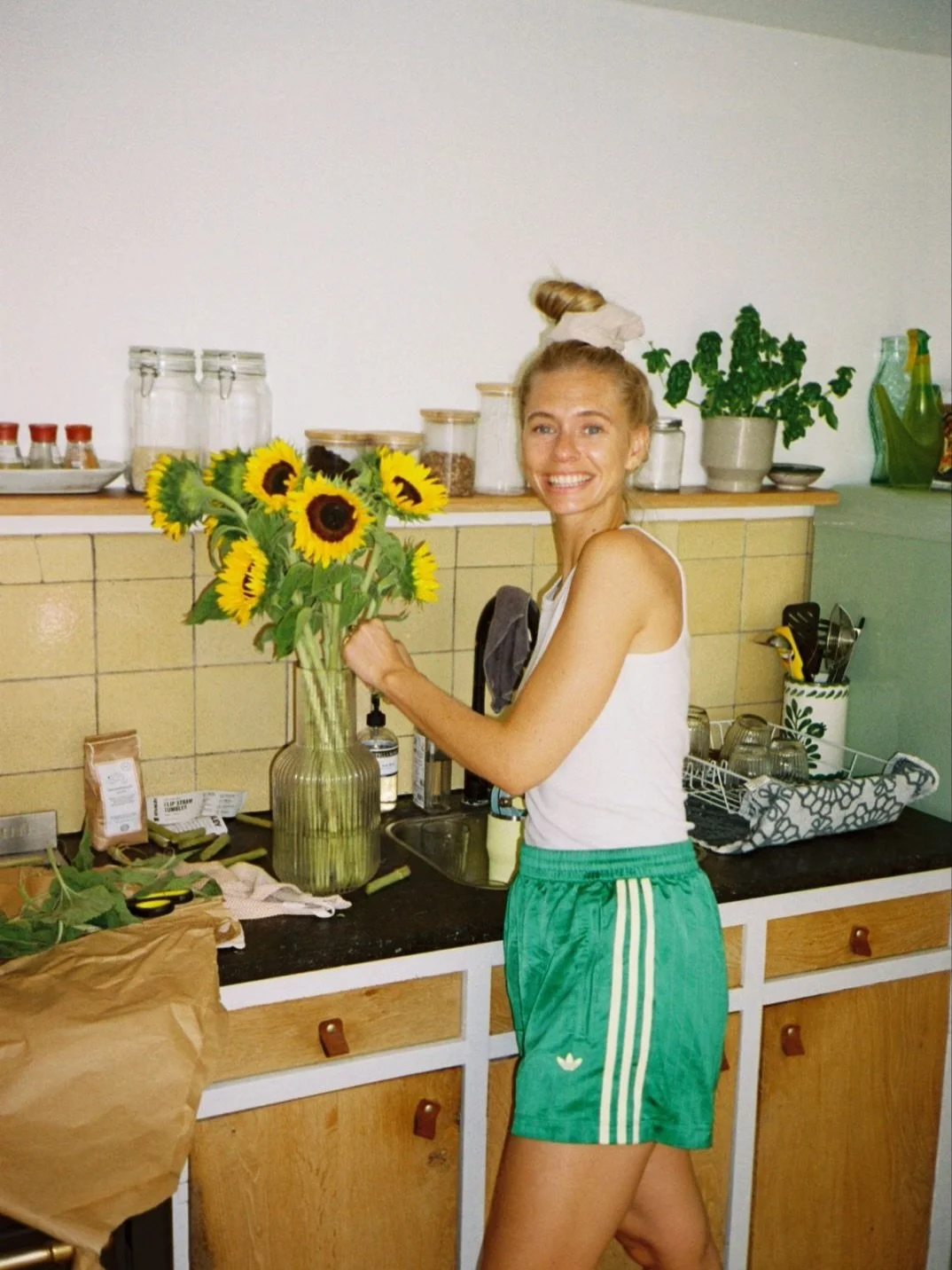 Favorite place at home: our handmade wooden kitchen 💛 more for flowers and coffee than cooking (iykyk). + can&rsquo;t wait for sunflower season!