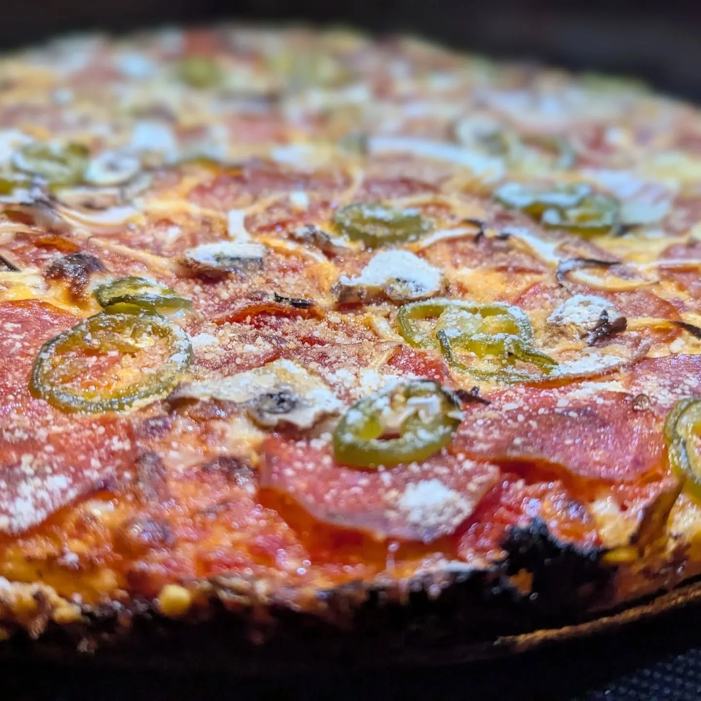 It's Friday. Heard about bar pizza. Thinner crust with cheese and toppings to the edge to brown.