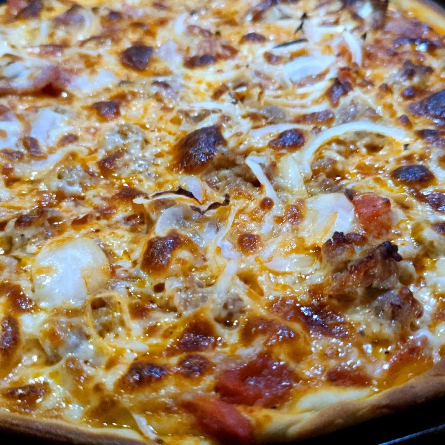 Made a cracker thin crust with half ham/onion half Italian sausage/onion. Throwback to pizza hut thin from back in the day when I worked there.