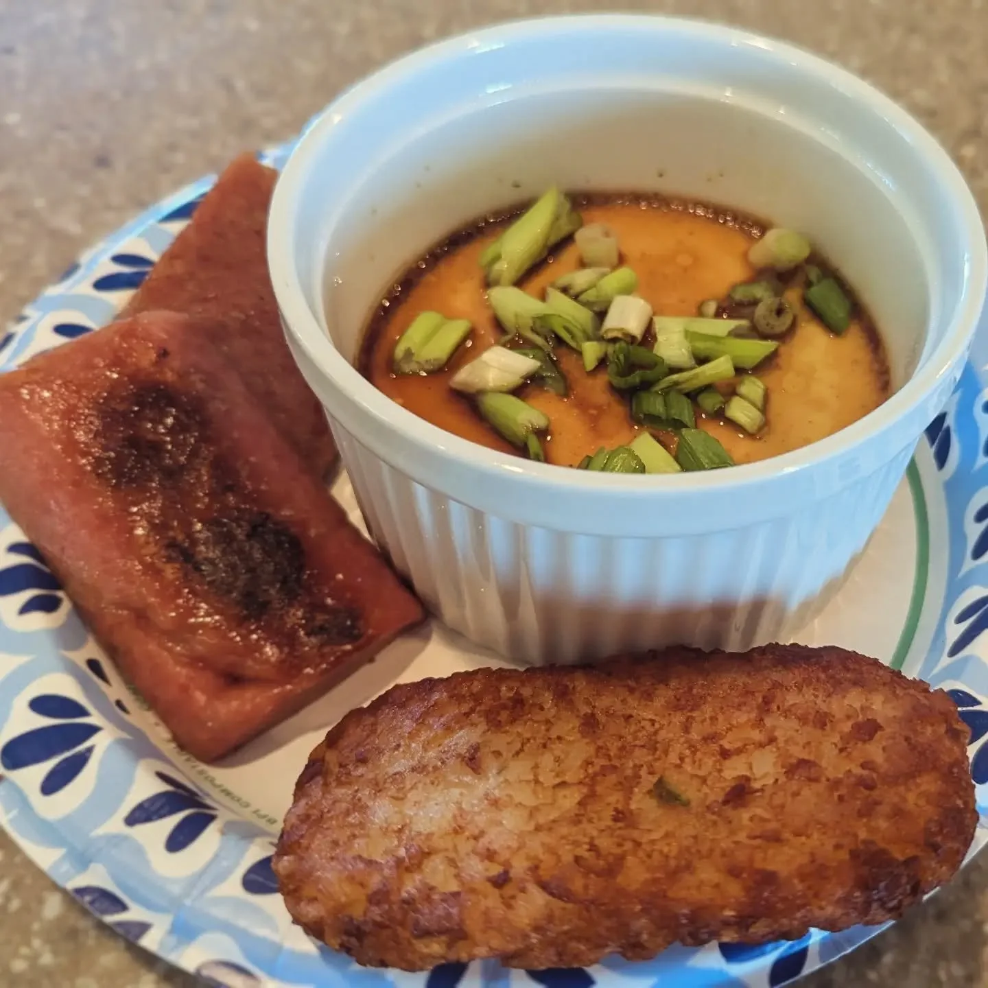 Spam gets a bad rap but steamed eggs, hash brown and spam is a great way to start the day.