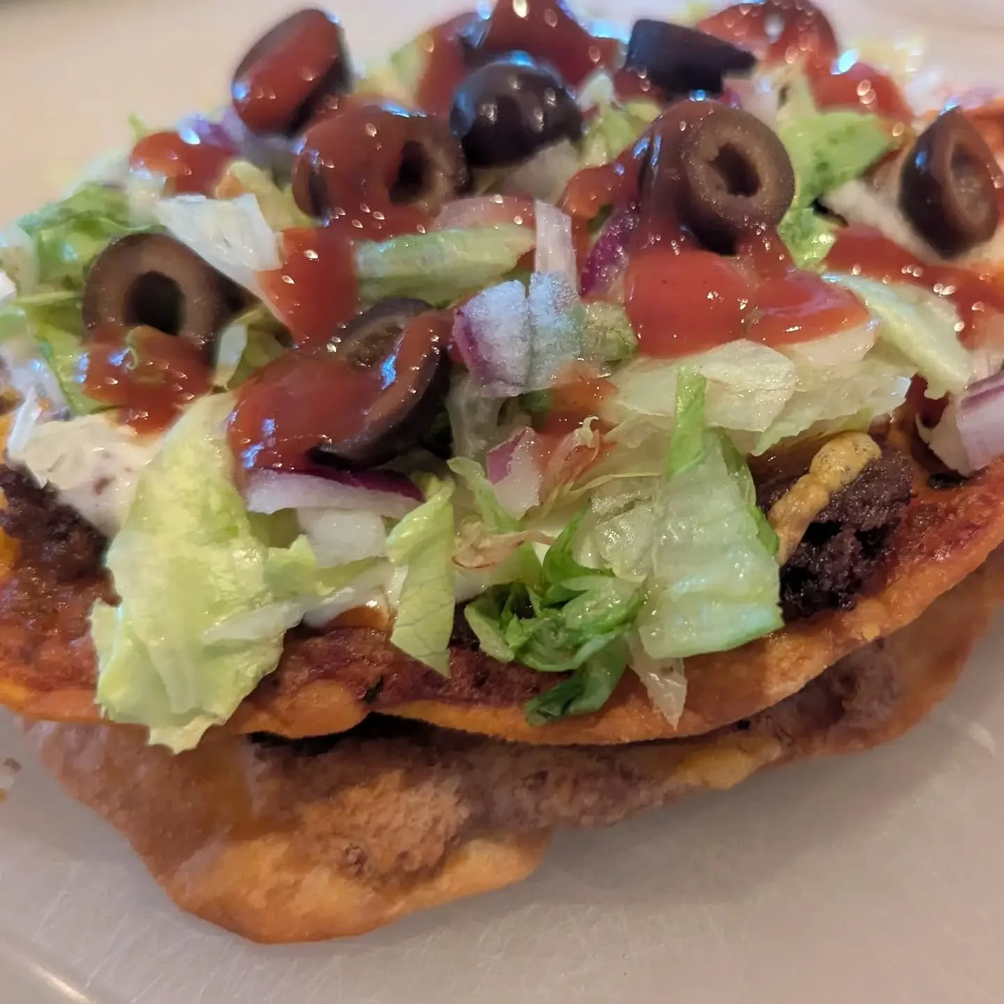 We have taco bell at home. Mexican pizza!