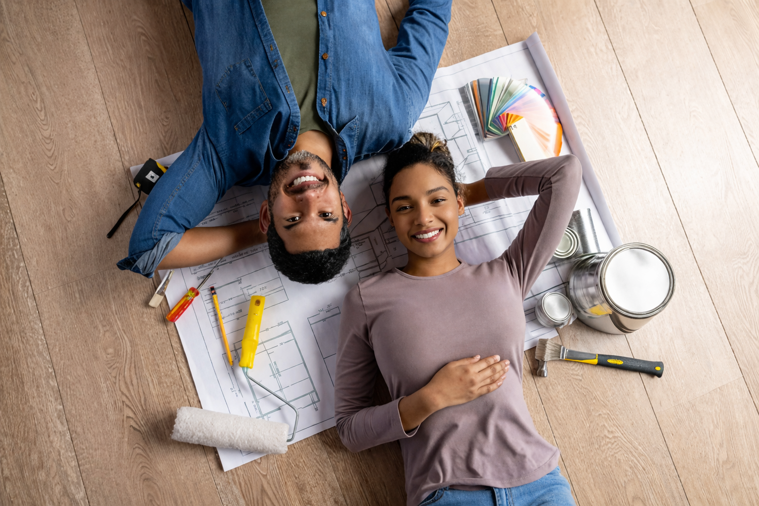 Home renovation planning with clients reviewing paint colors, materials, and design concepts. This moment highlights interior design consultations, design strategy sessions, and personalized home transformations in Atlanta.