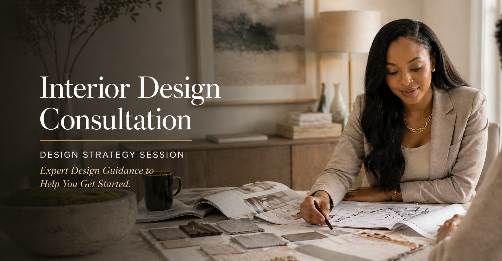 A woman participating in an interior design consultation, reviewing fabric swatches and color samples at a table, with interior decor and artwork in the background.