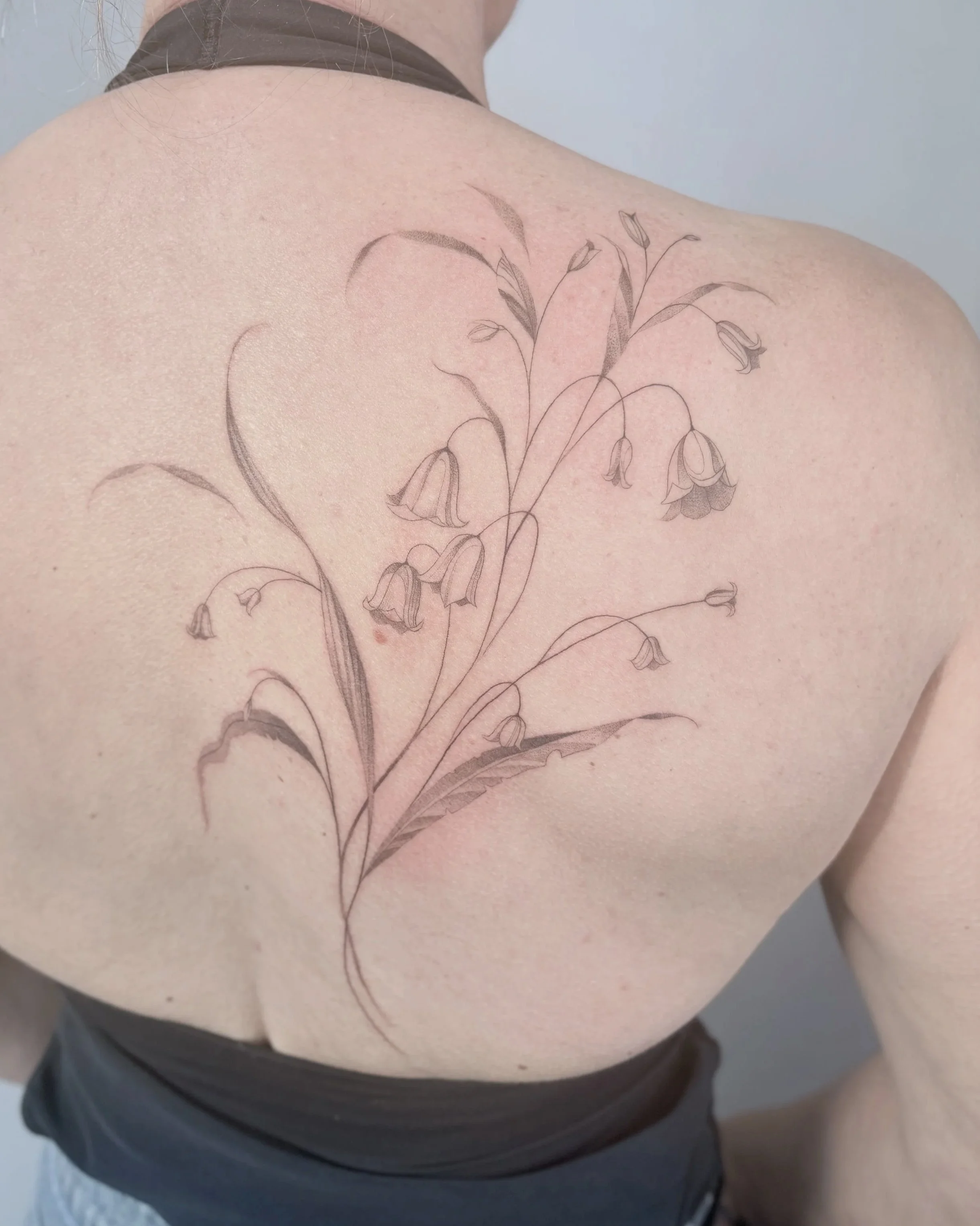 lelietjes van dalen tattoo rug
