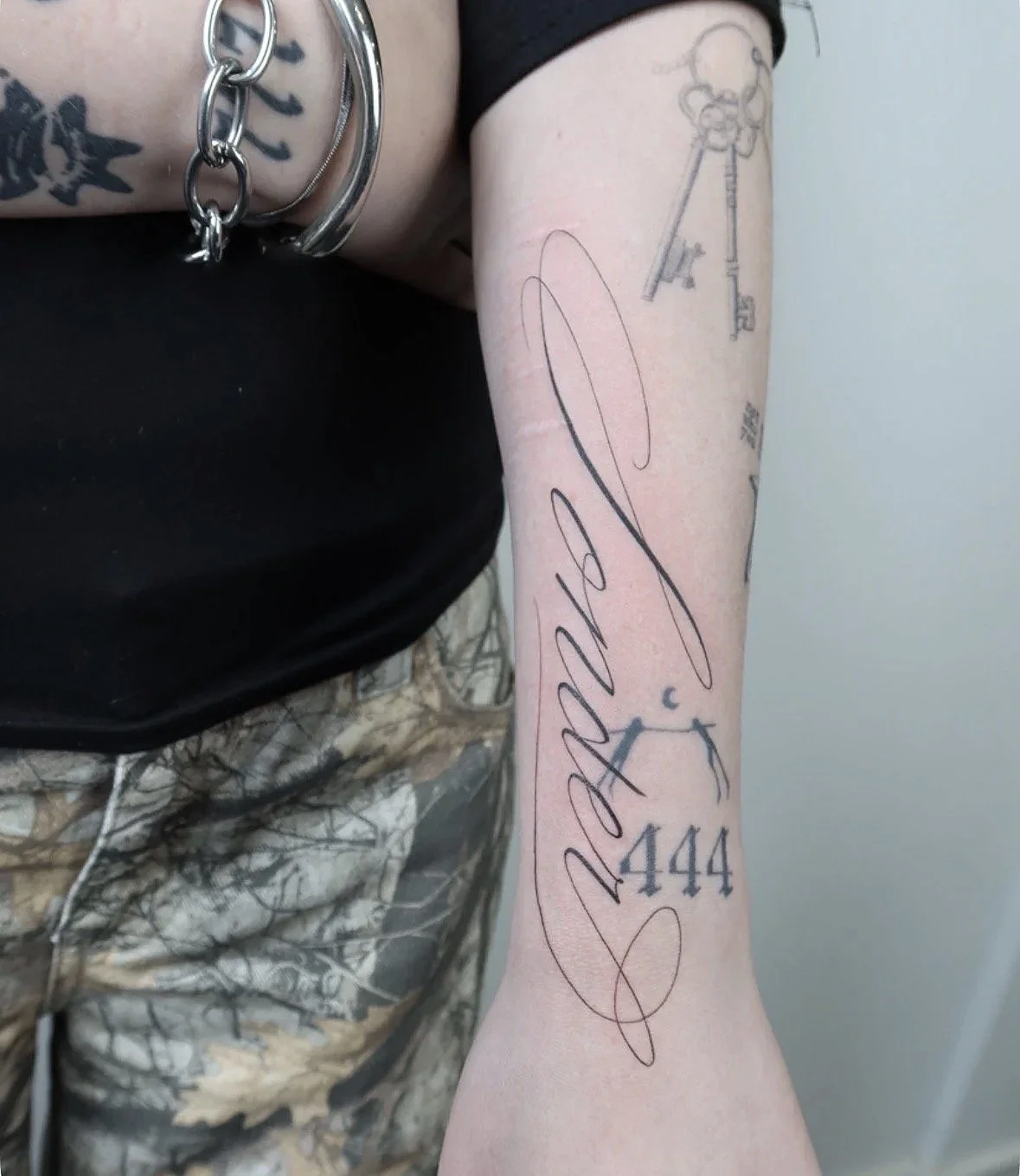 script lettering tattoo