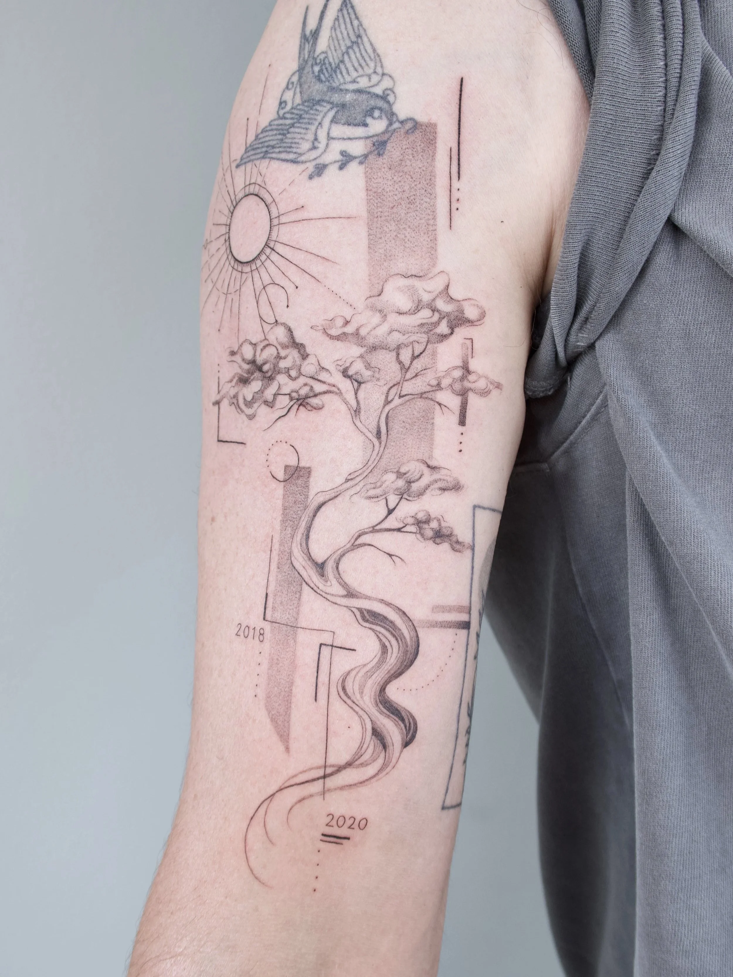 geometric fineline bonsai tree boom man tattoo