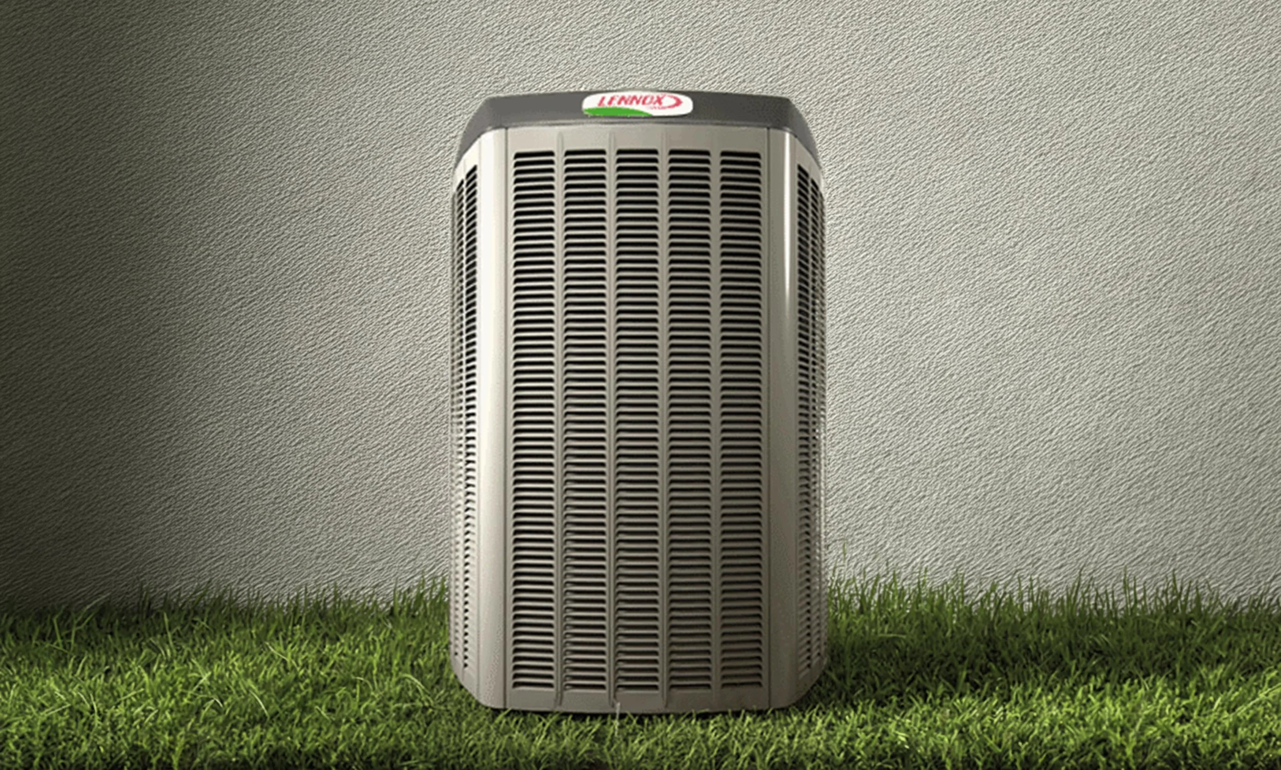 Person servicing an outdoor air conditioning unit with wires and tools.